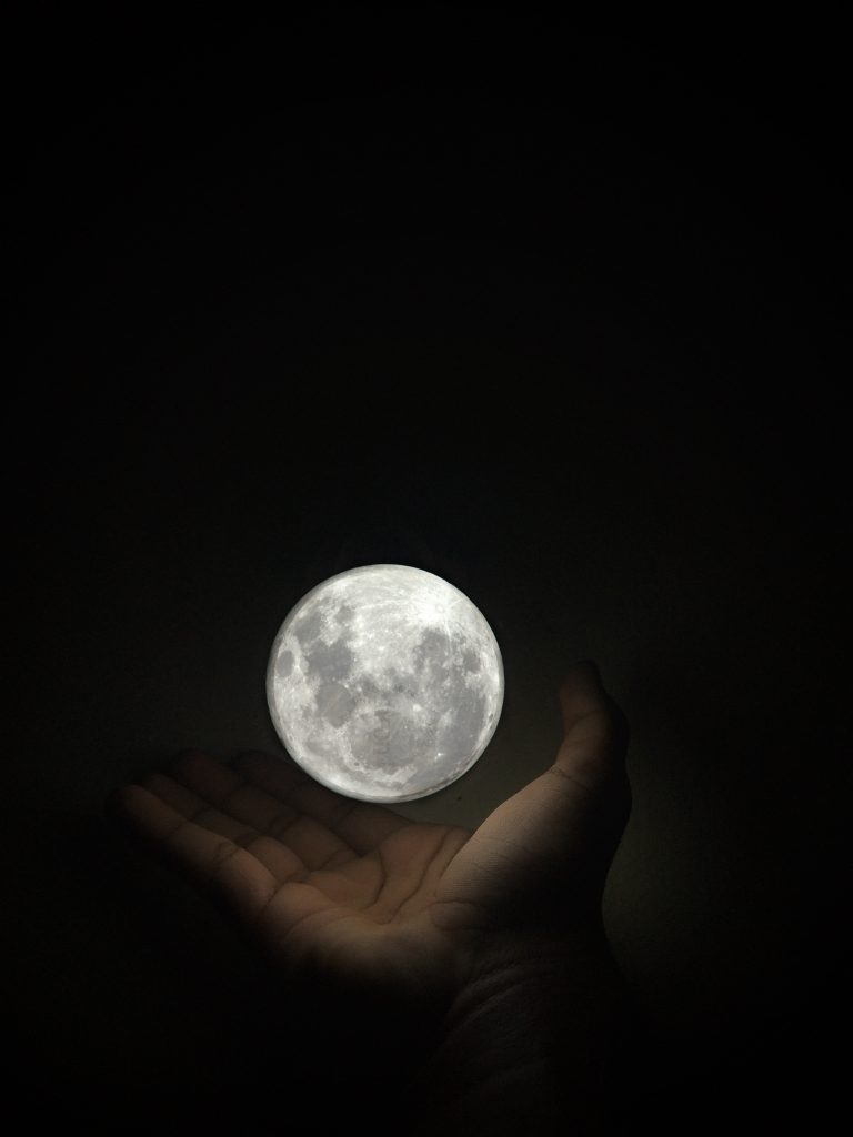 Depicting moon in hand - PixaHive