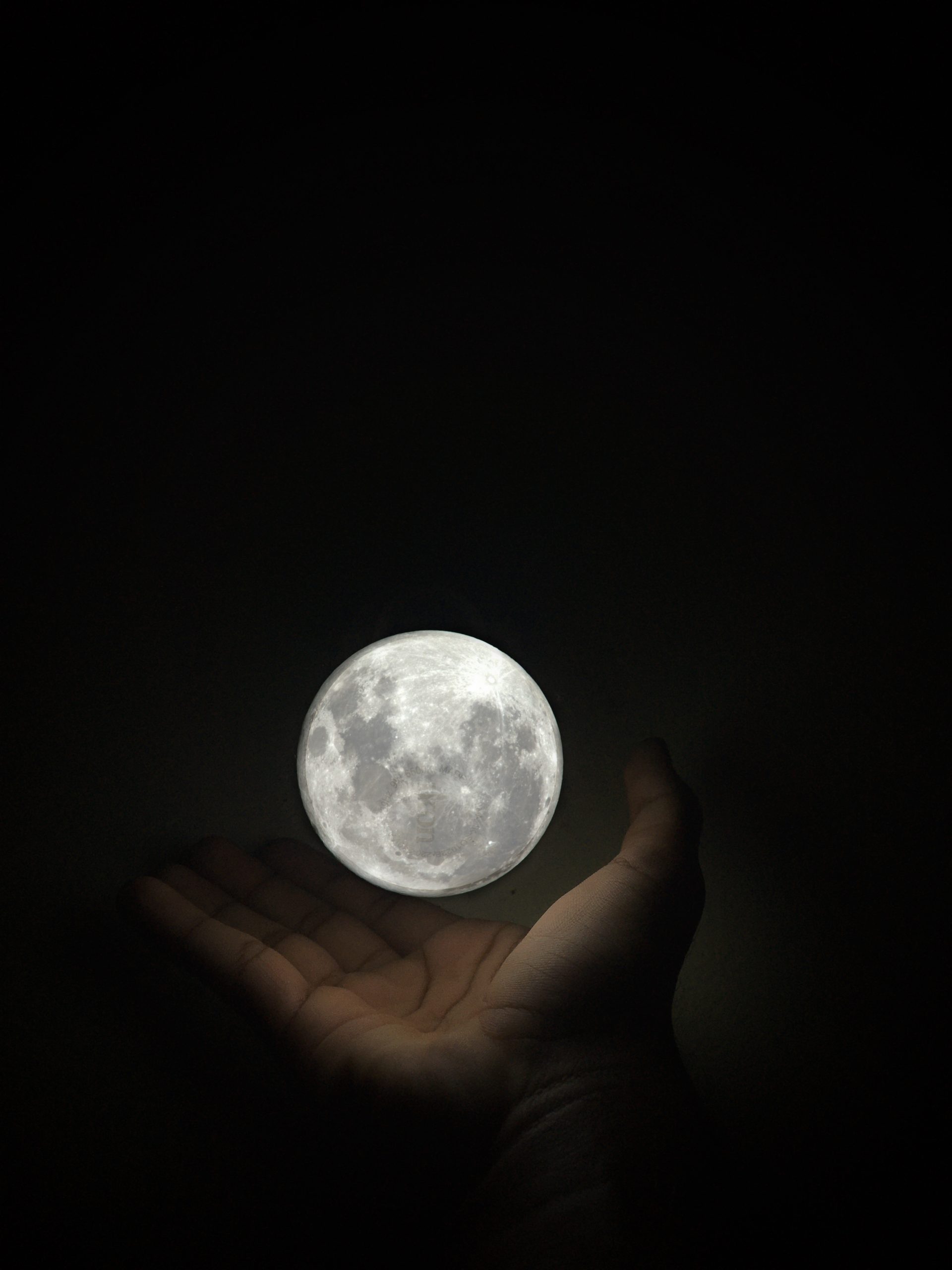 Depicting moon in hand