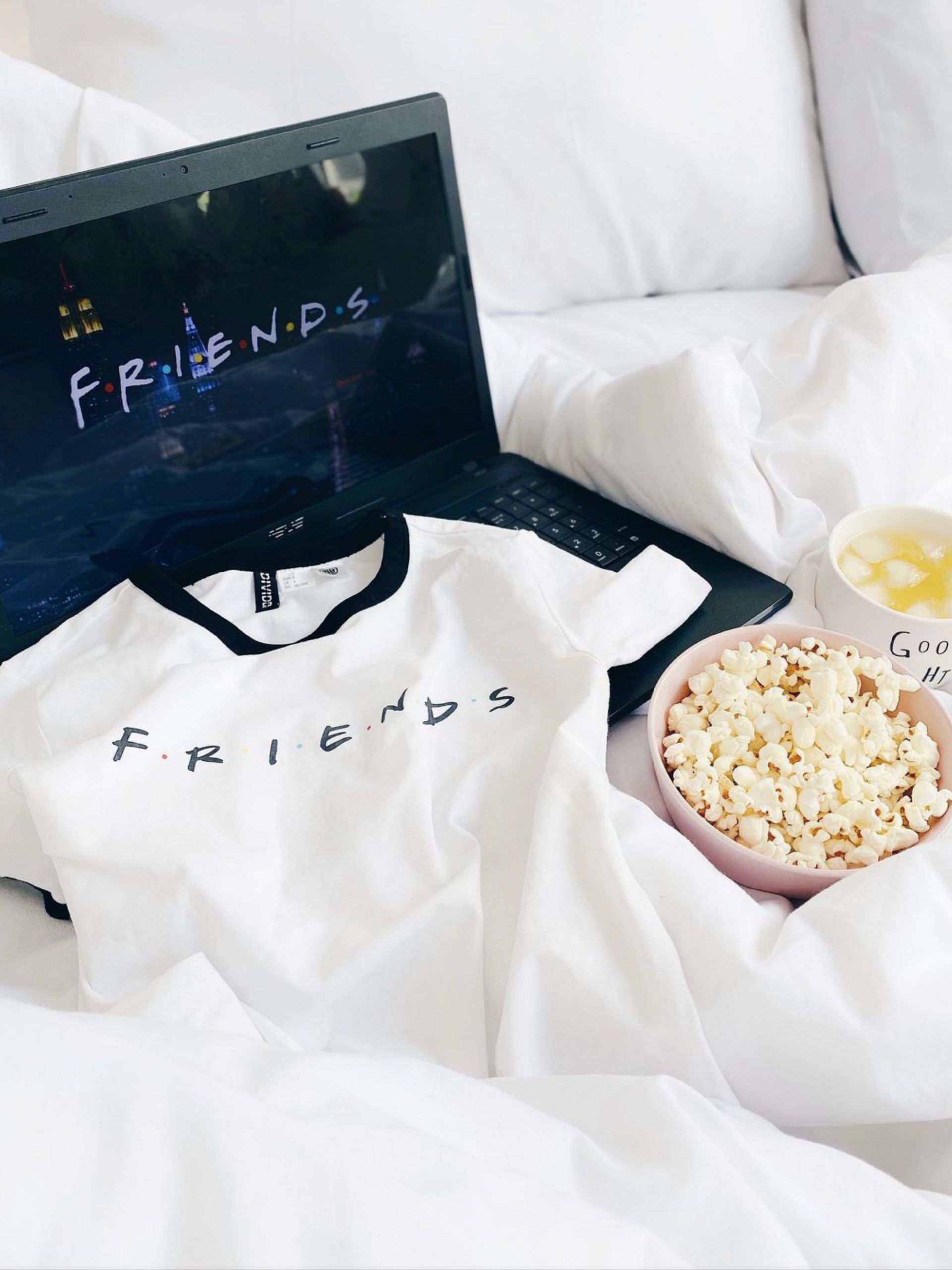 Friends tv show with bowl full of popcorn