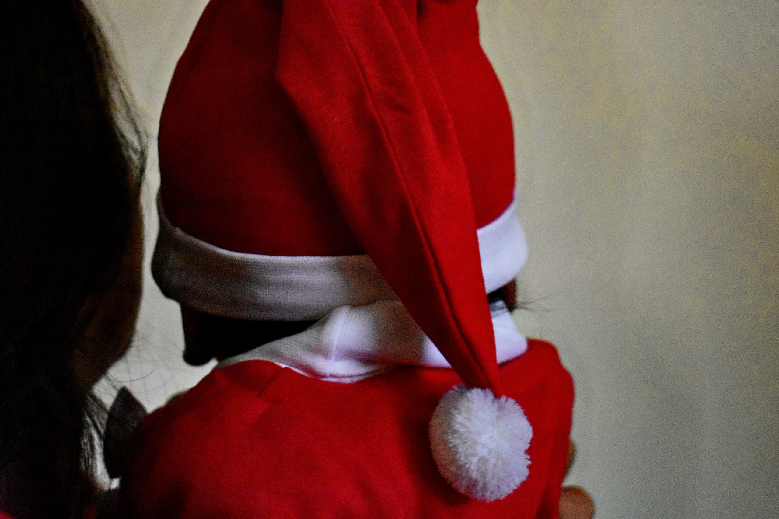 A kid in Santa Claus getup