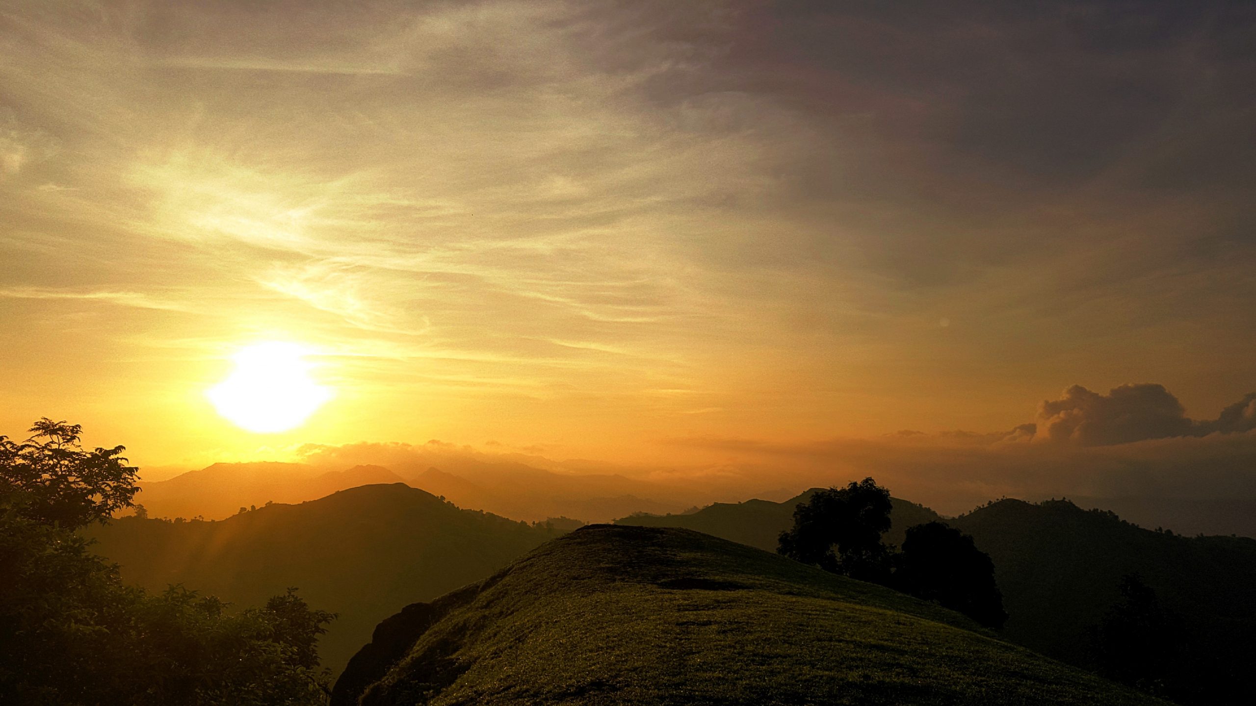 Sun shining on mountains