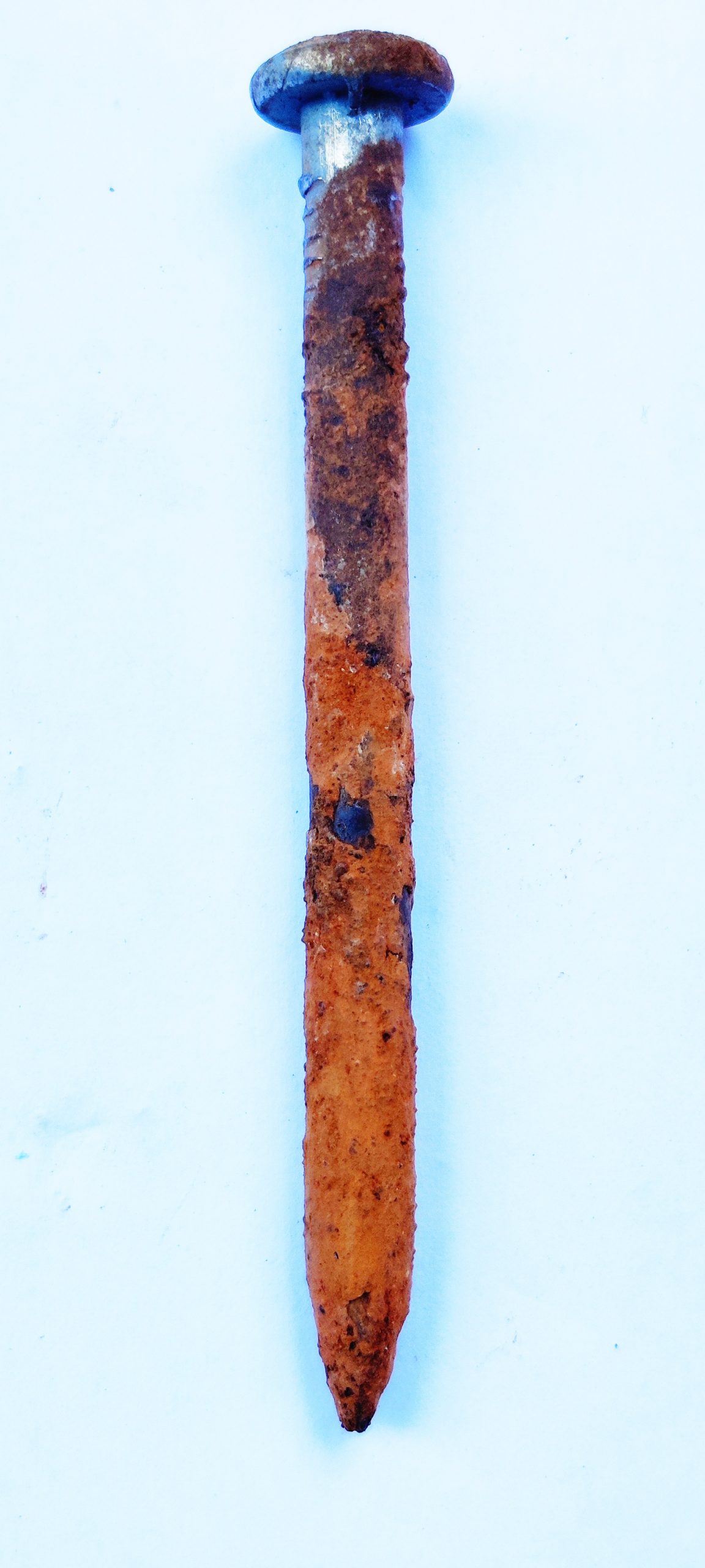 A rusted rivet