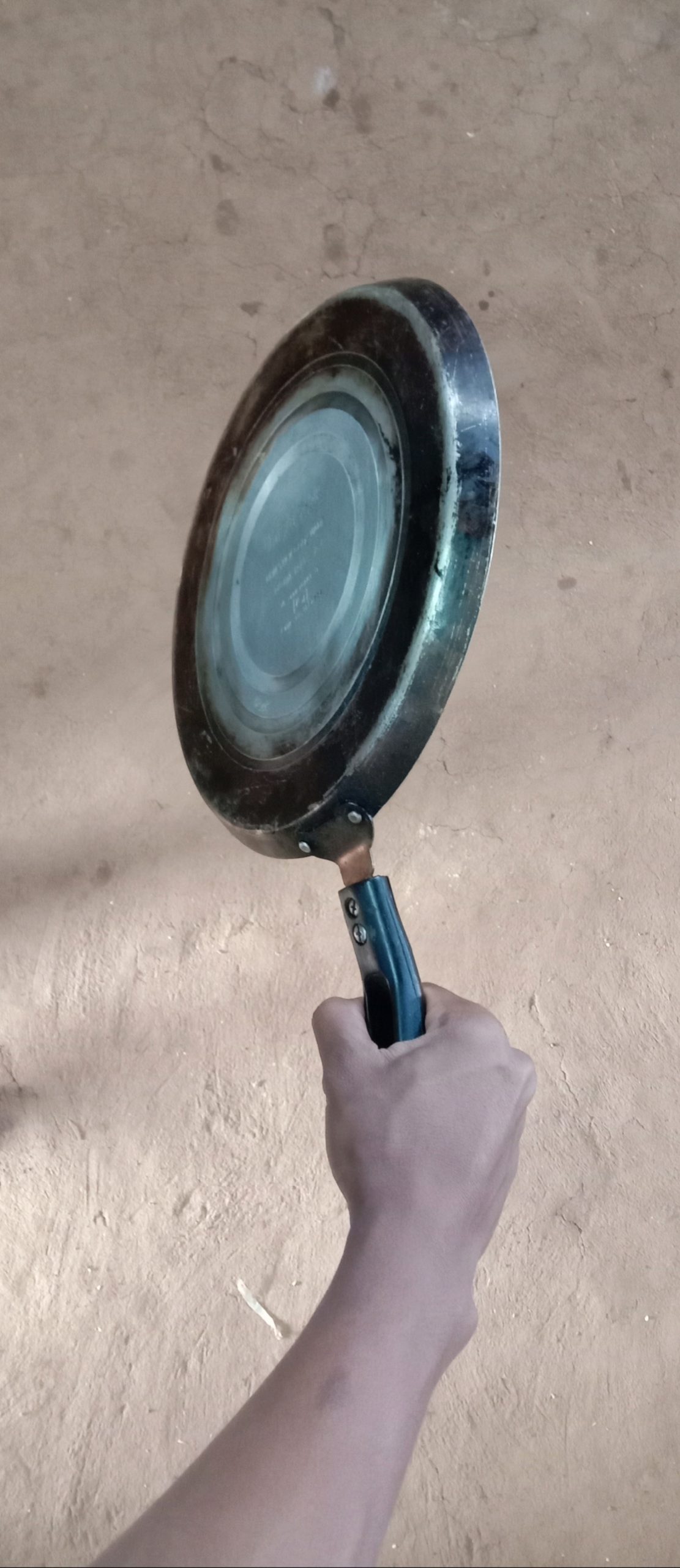 A pan in hand