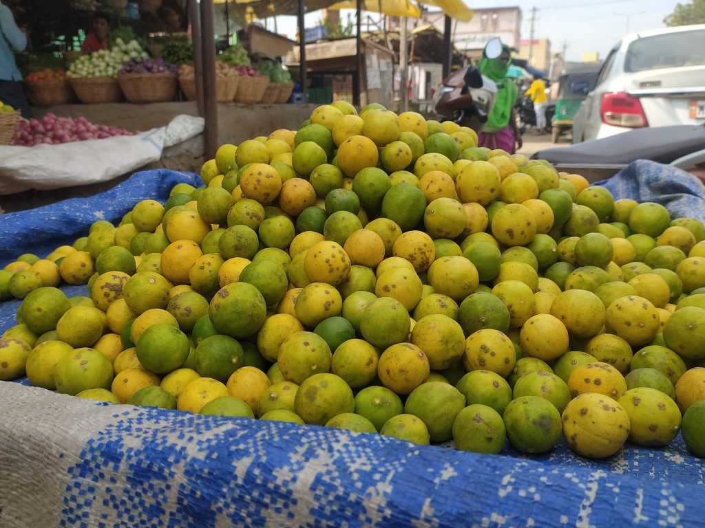 Selling lemons in a market place PixaHive