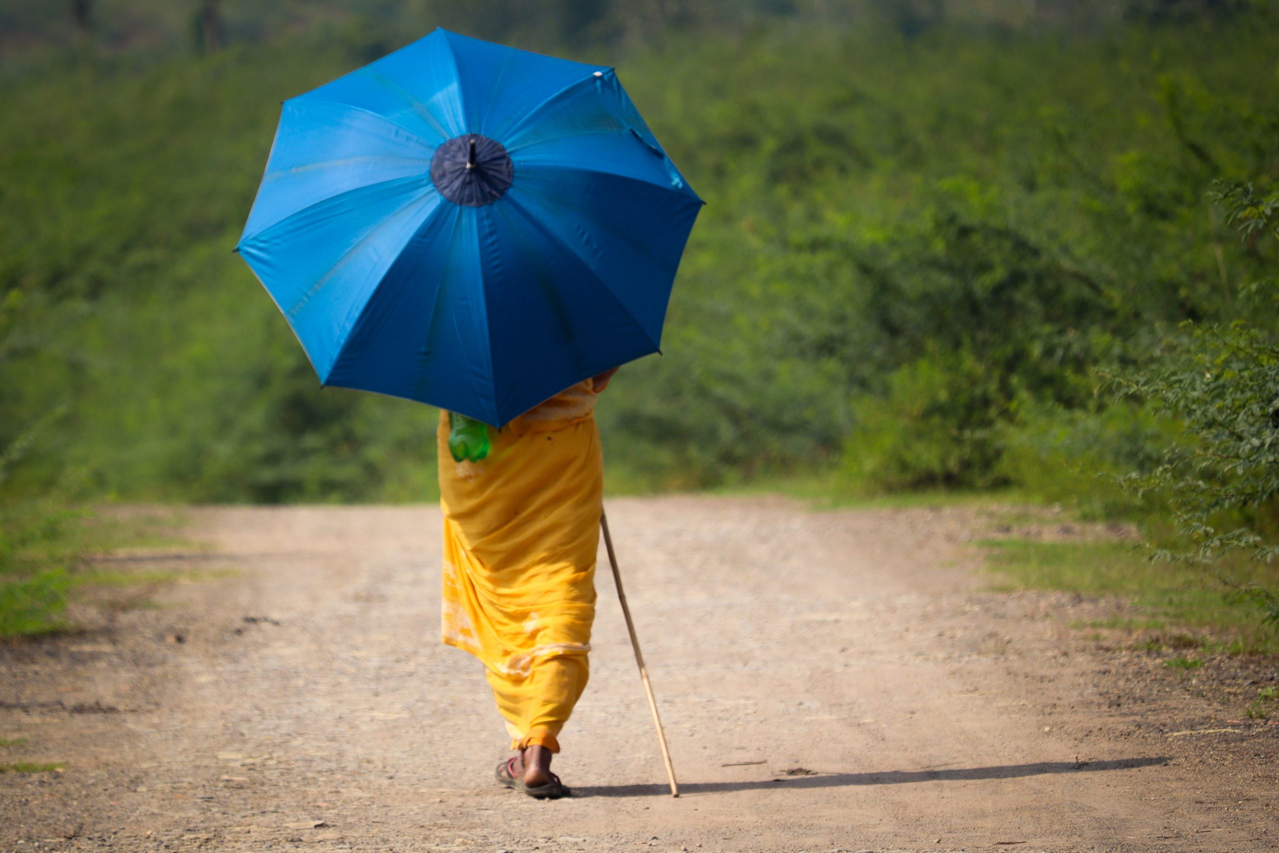 woman walking with umbrella