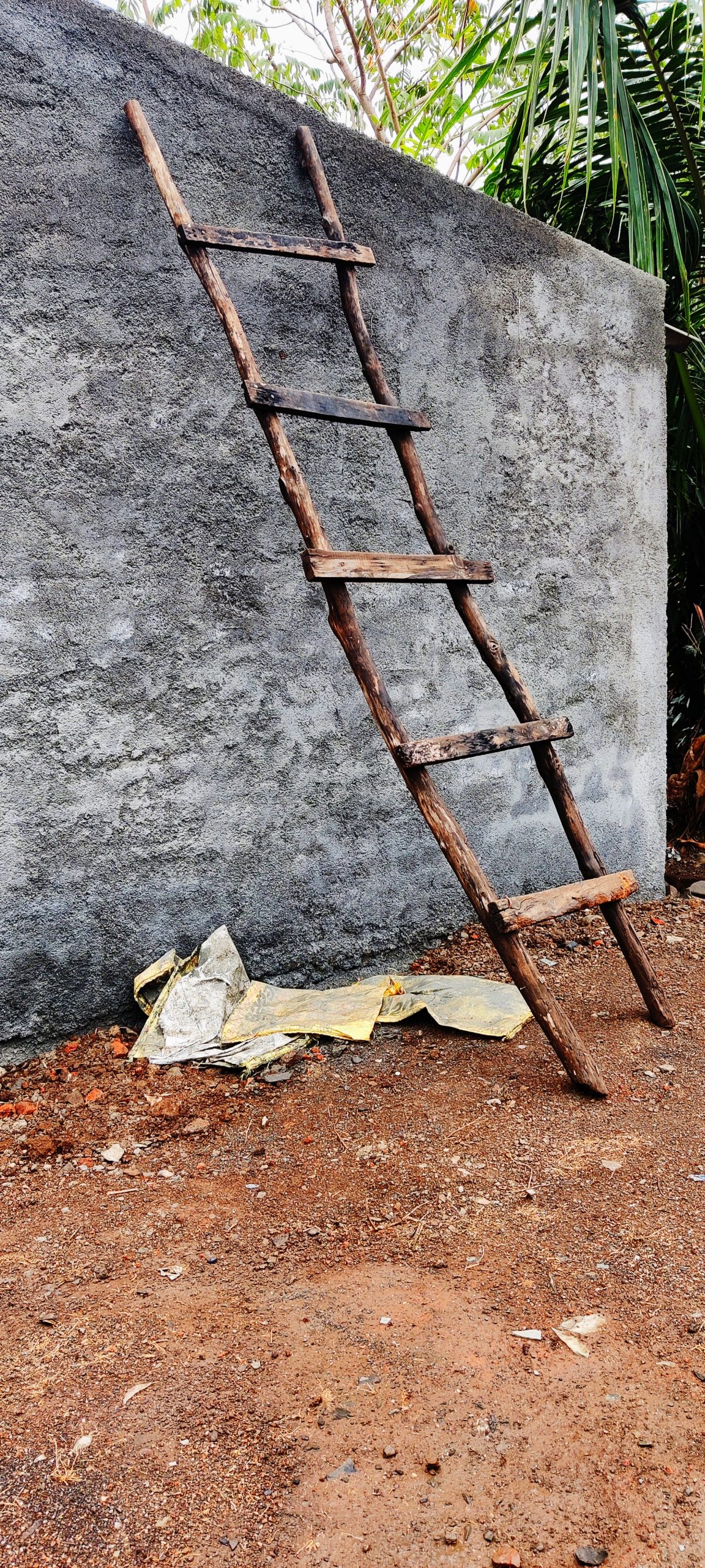 Ladder standing beside the wall