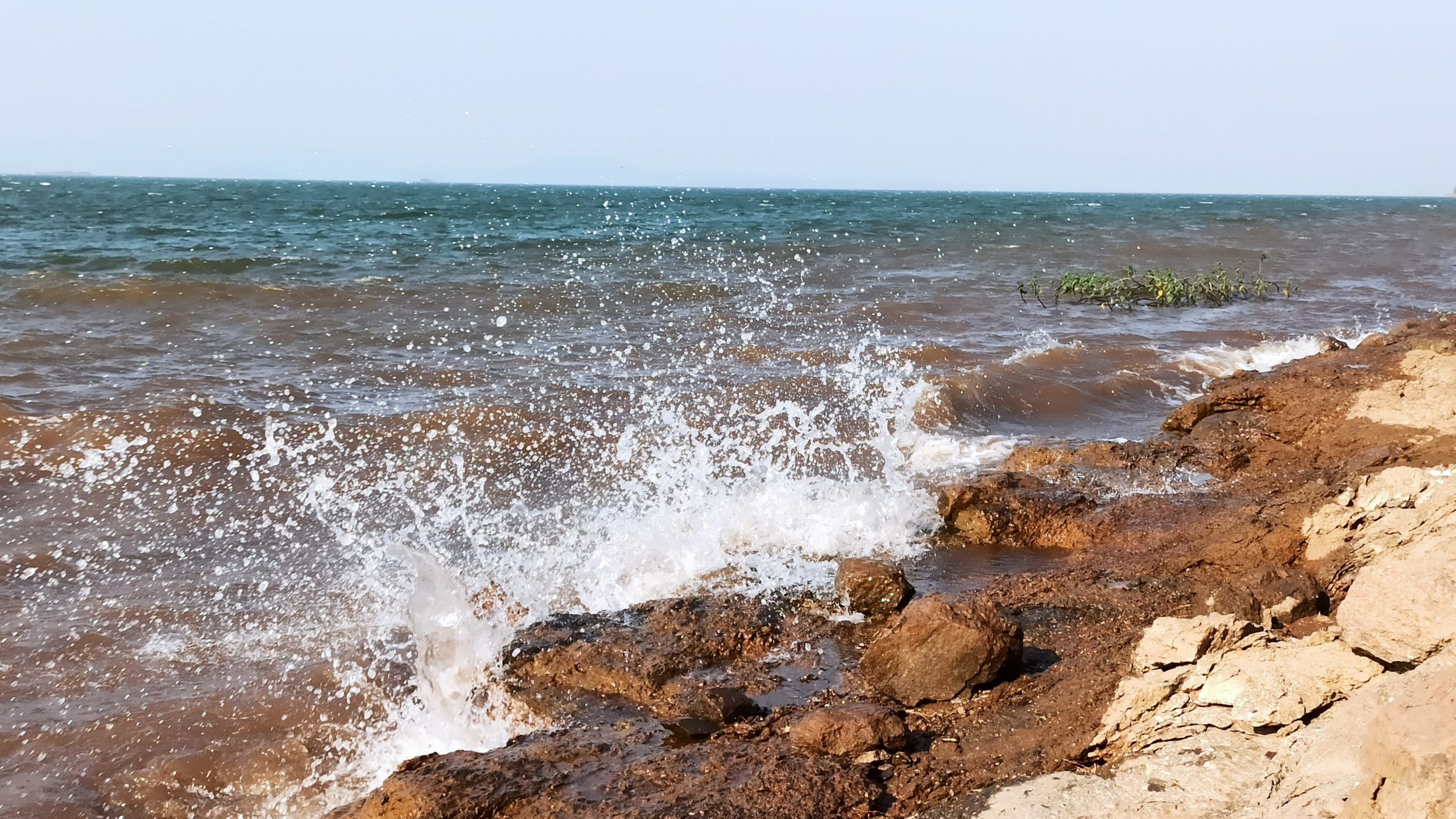 waves splashing against rocks