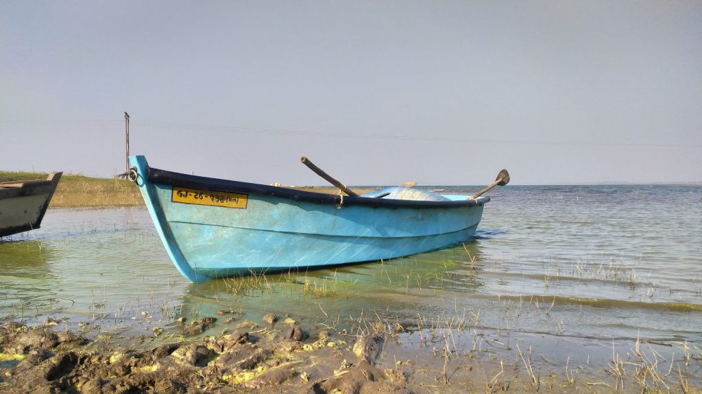 wood boat on blue water in beach - PixaHive