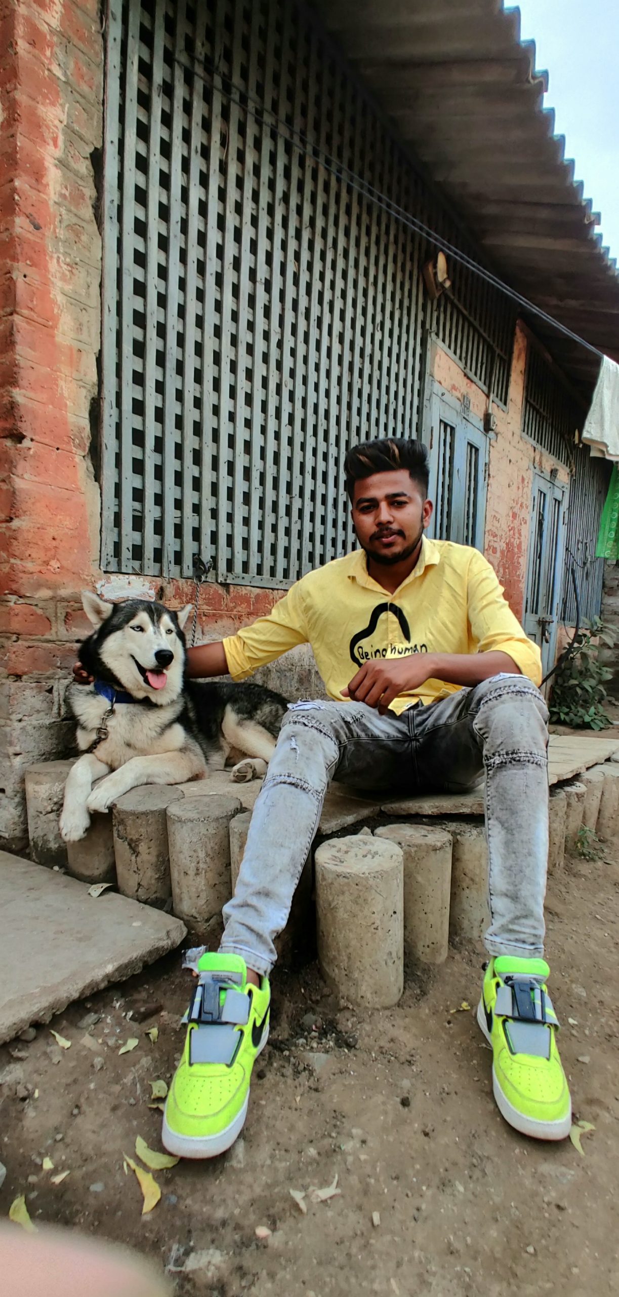 A boy with his pet dog