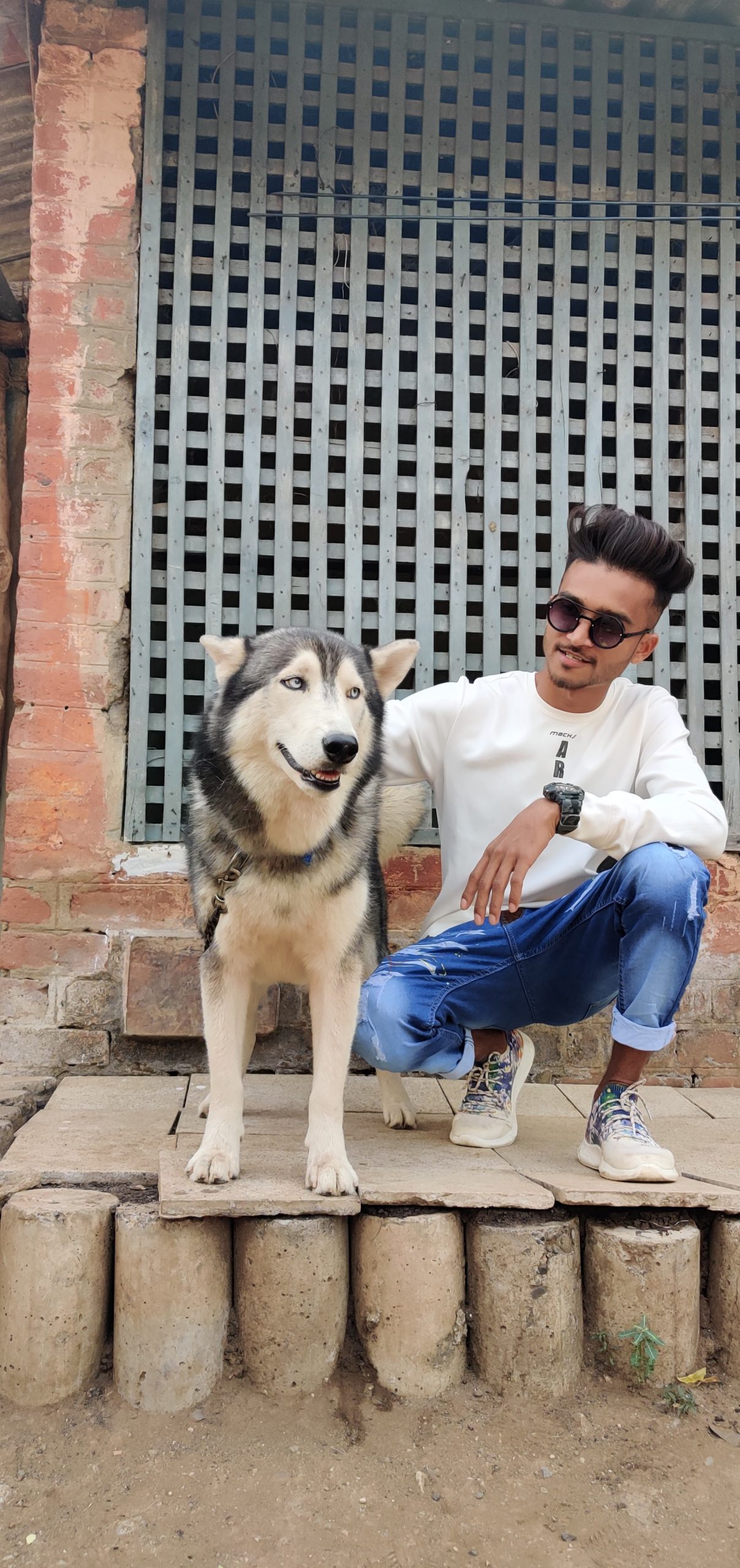 A boy with his pet dog