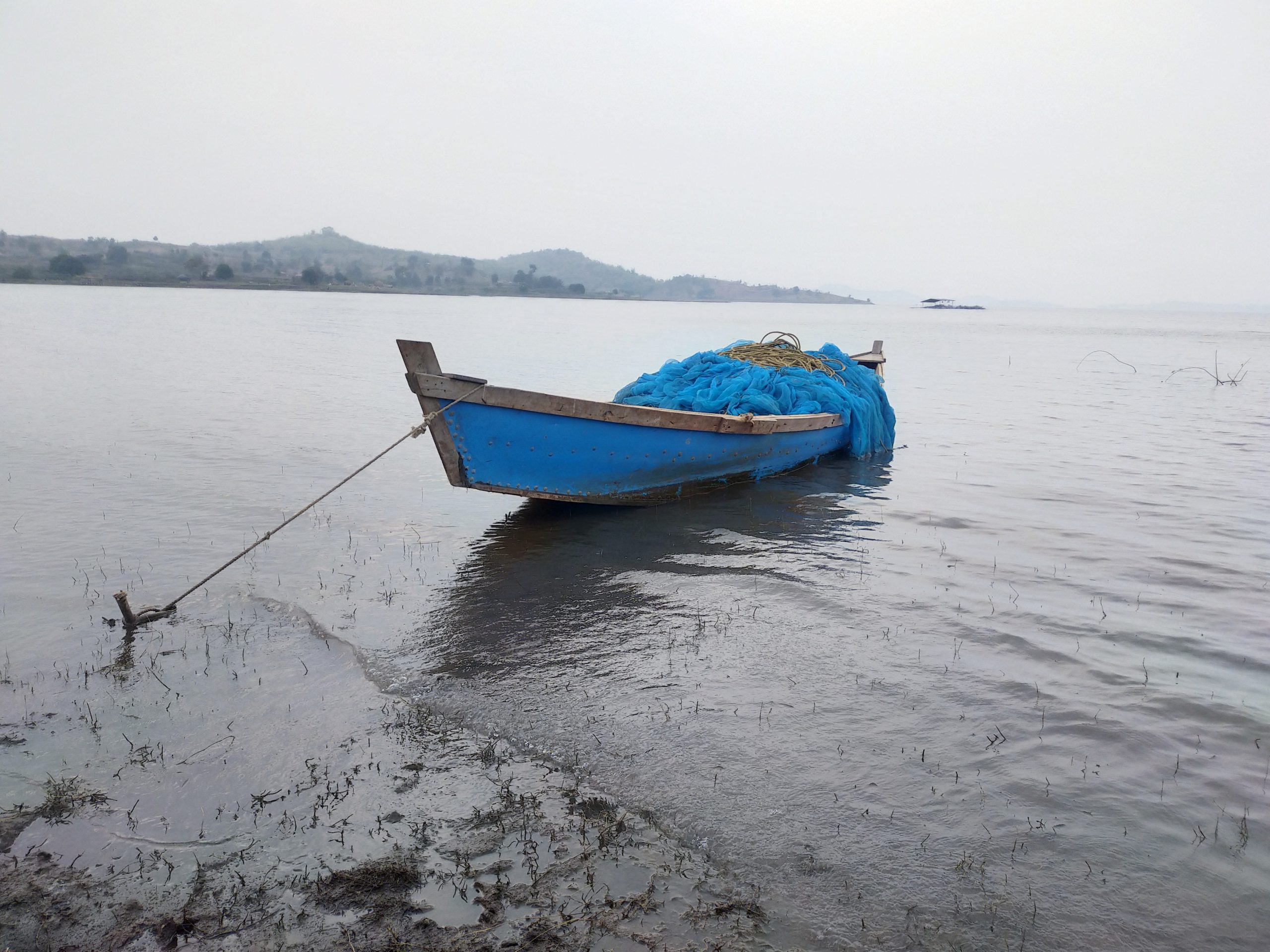 A fishing boat tied to shore