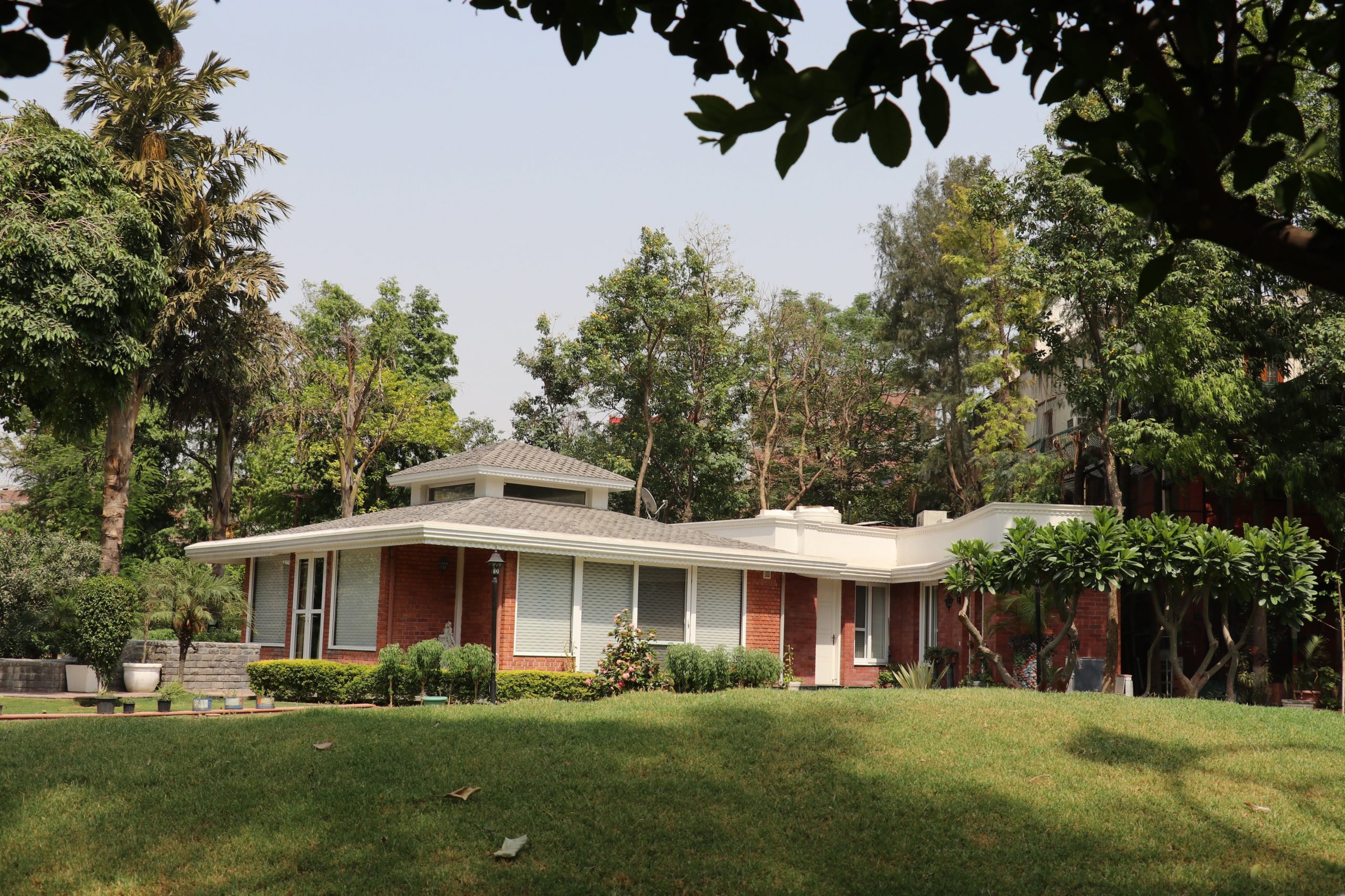 A house around greenery