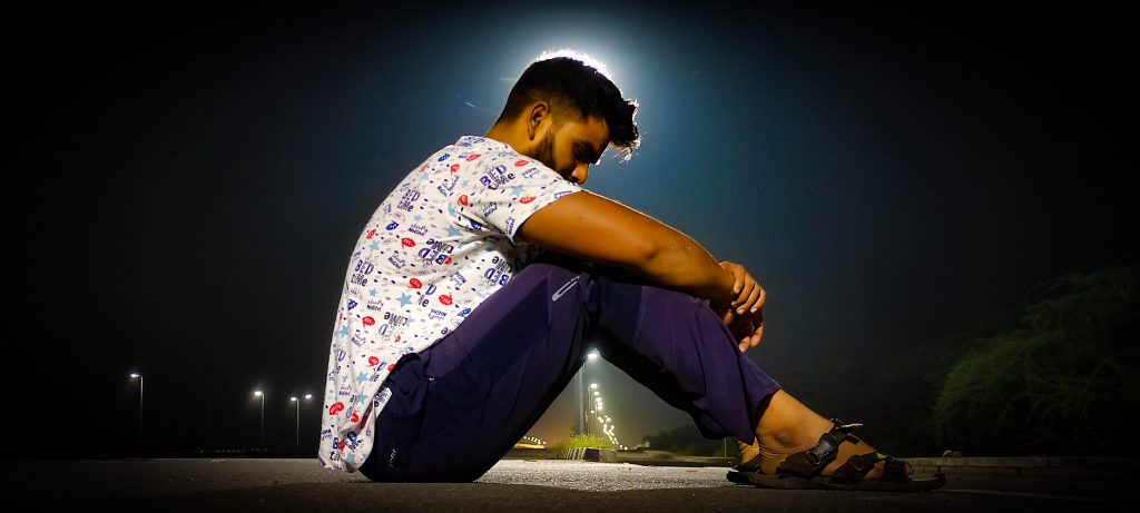 Model boy posing roadside - PixaHive