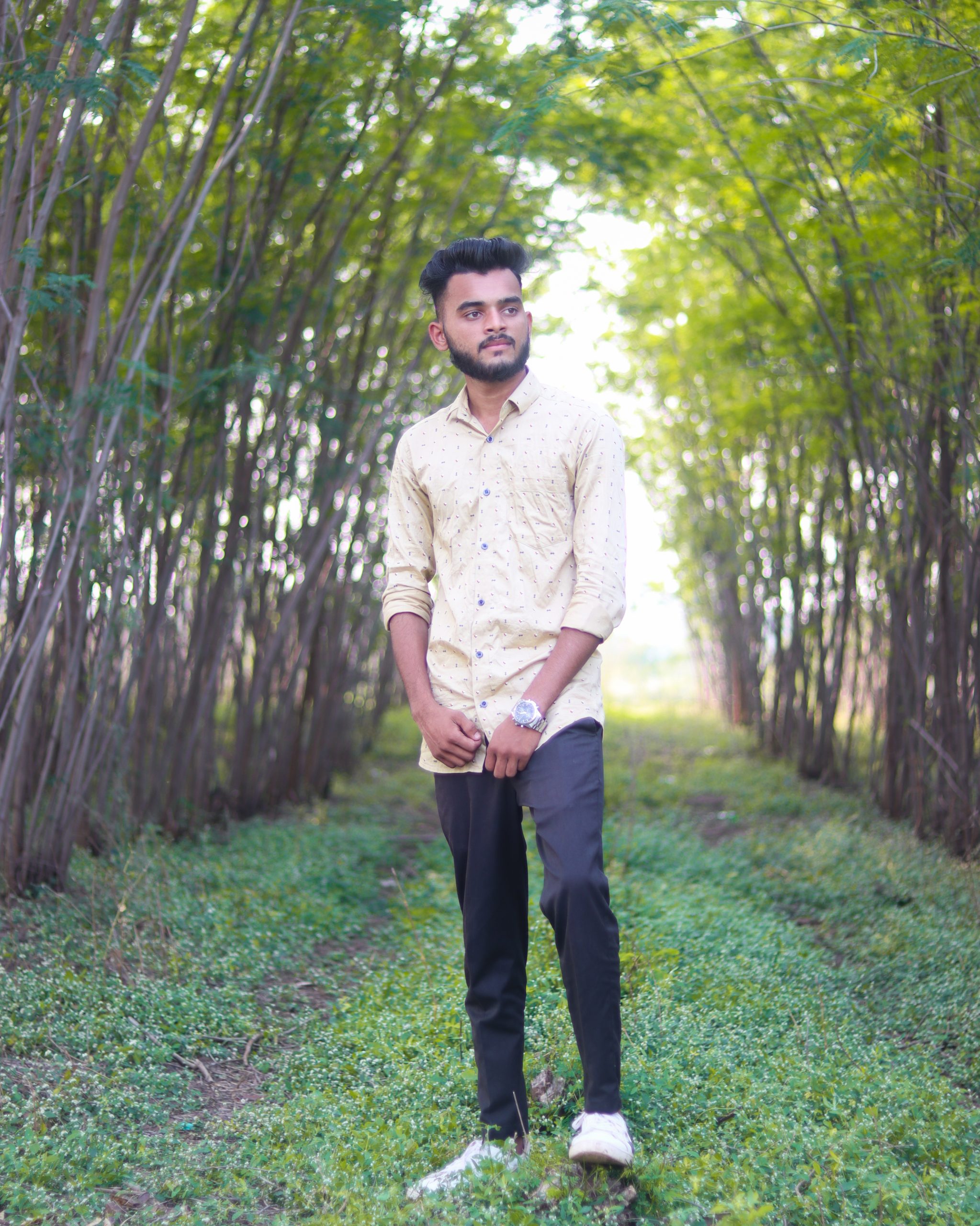 Premium Photo | Wildly Chic Indian Male Model Rocks Madras Check Shirt and  Cargo Bottoms Amidst Jungle Backdrop