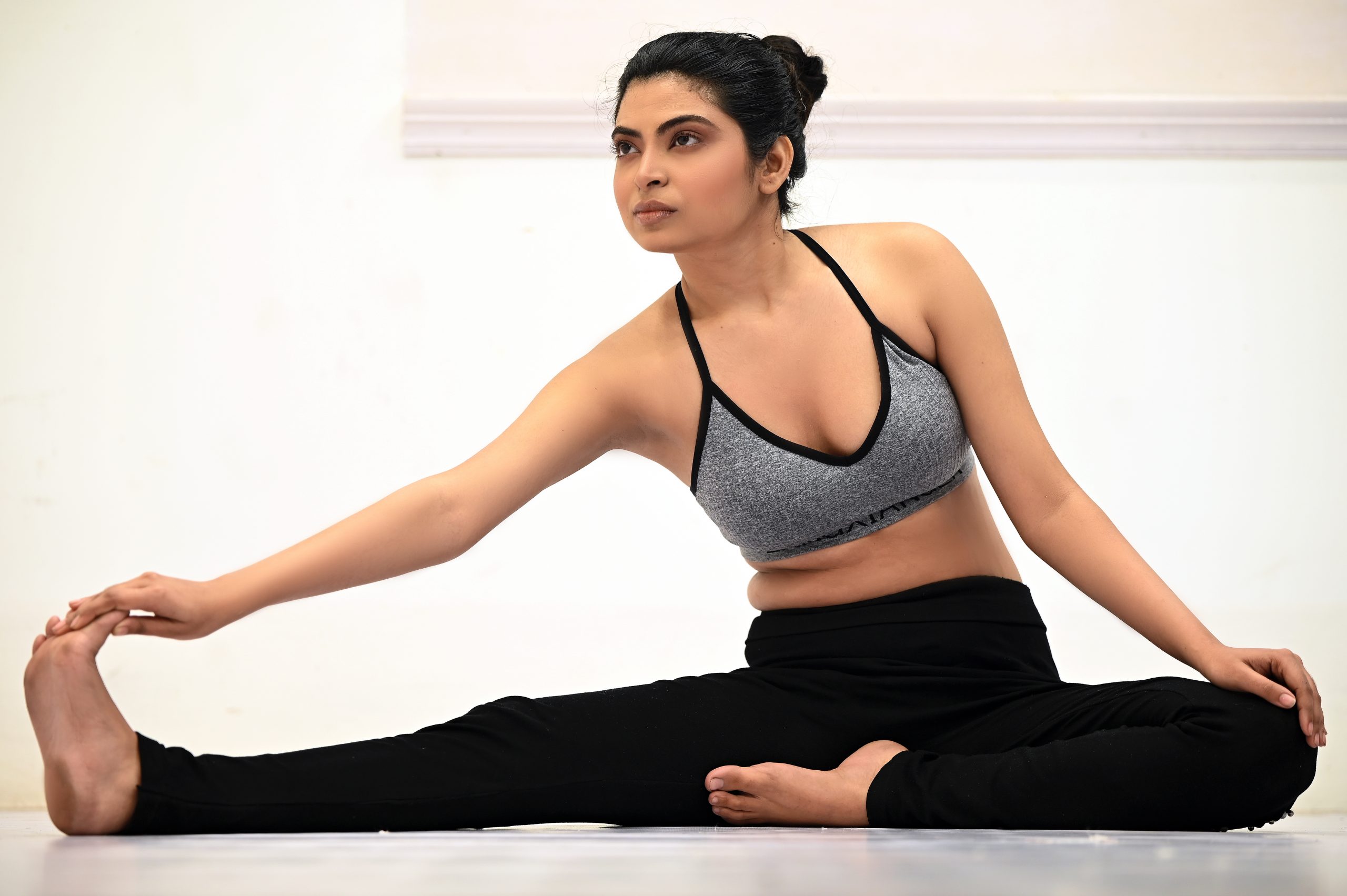 Hand to Knee Yoga Pose - Parivritta Janu Hastrasasana