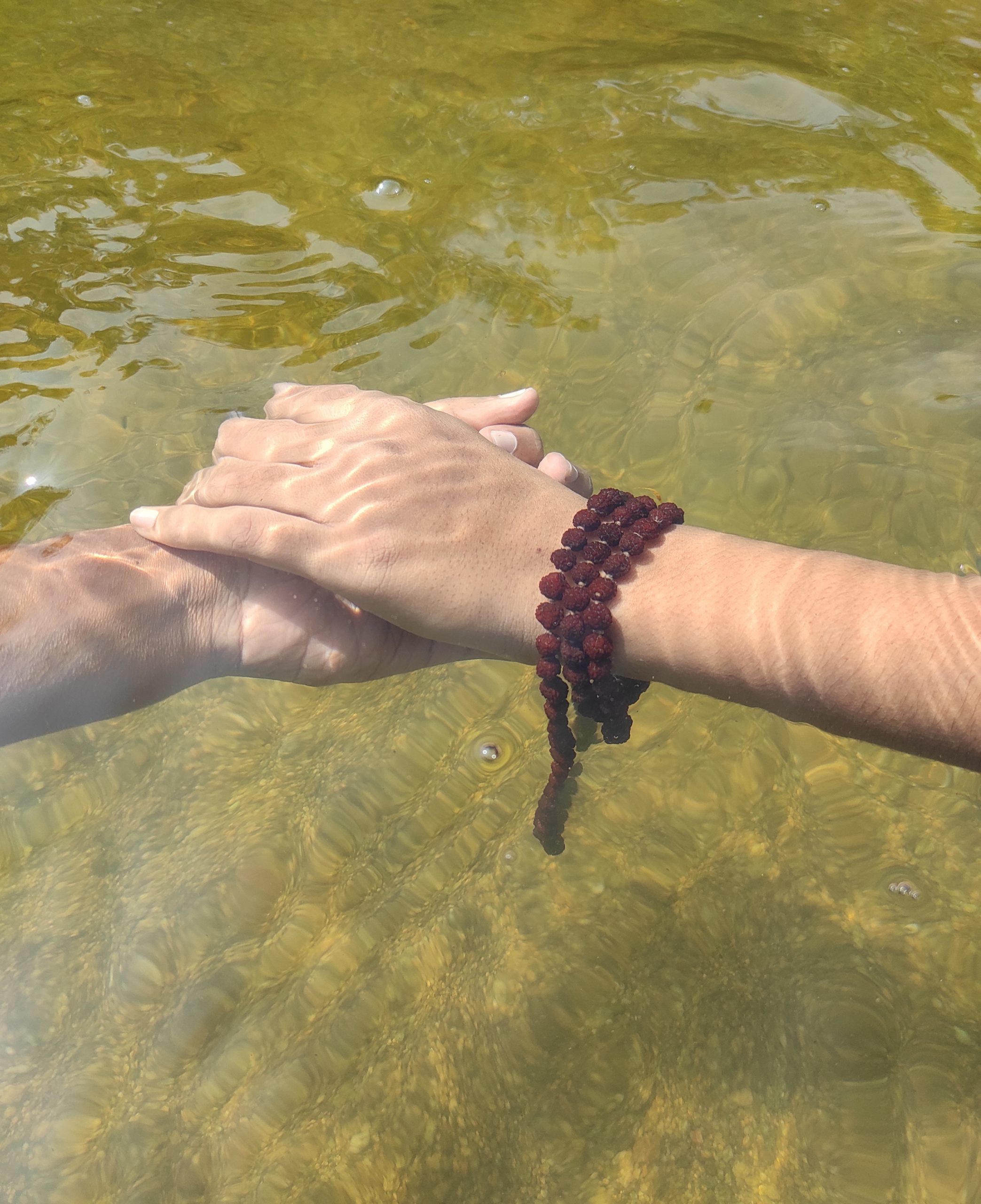Holding hands in water