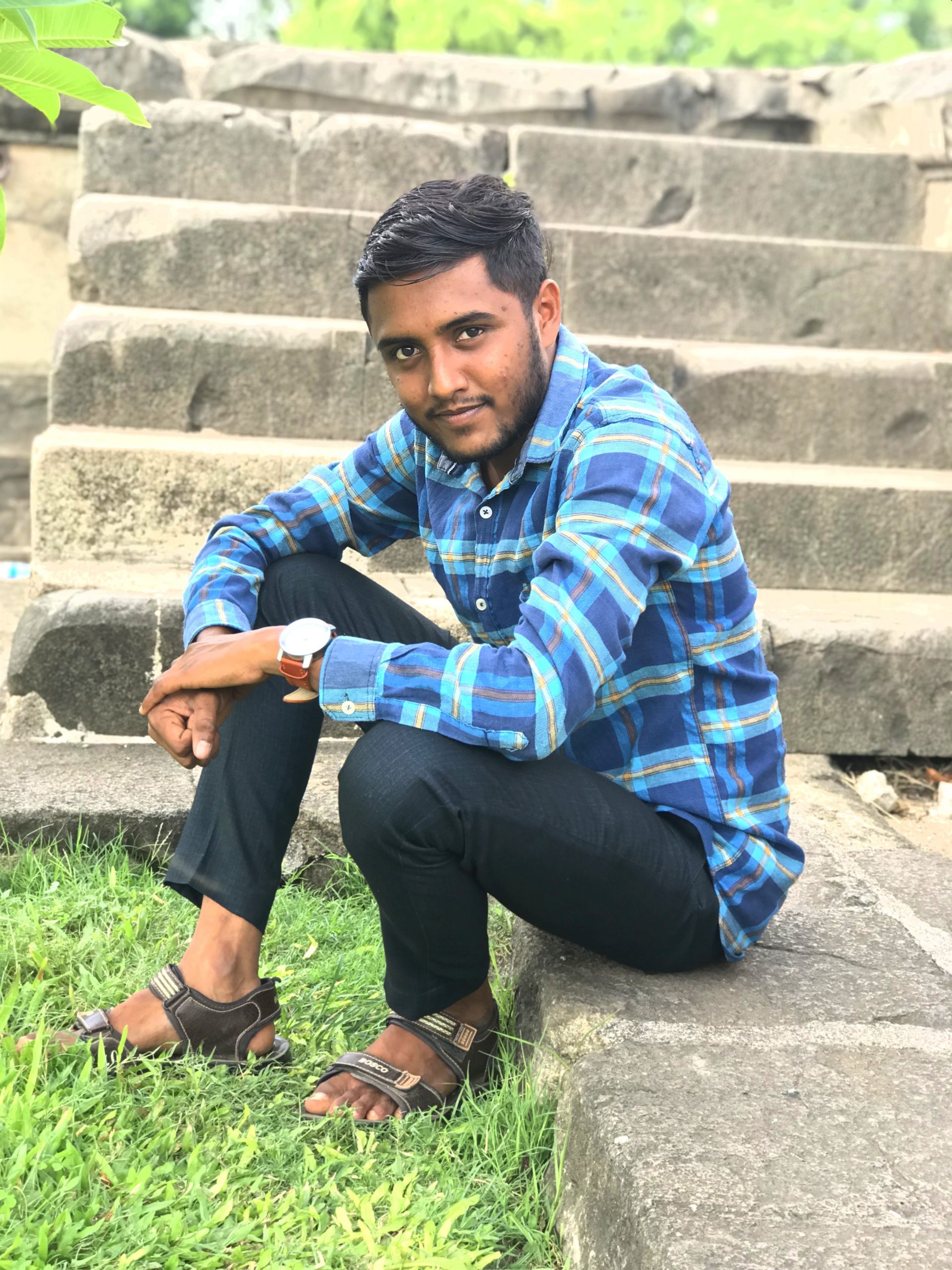 Boy sitting on stairs