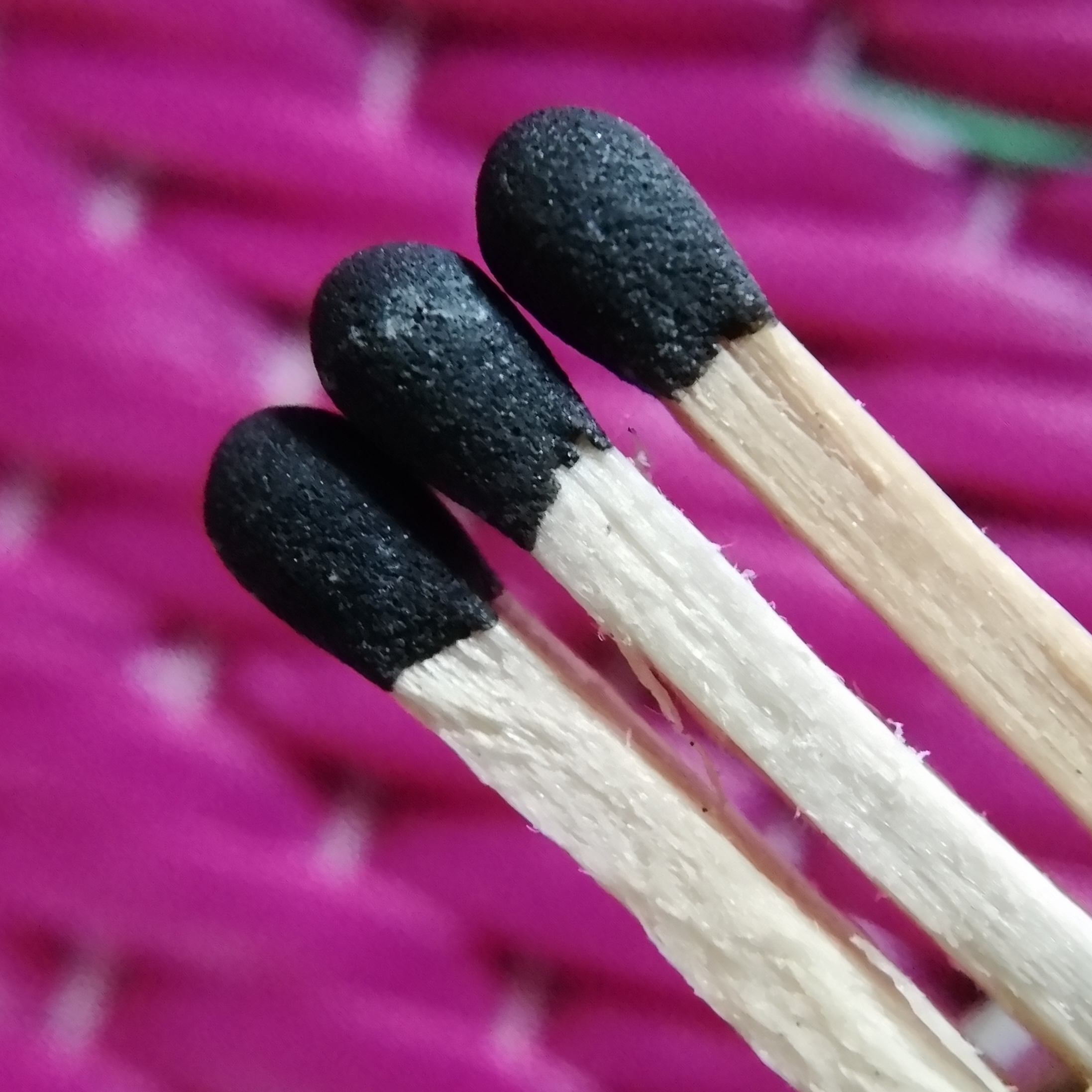 Match sticks with a pink background