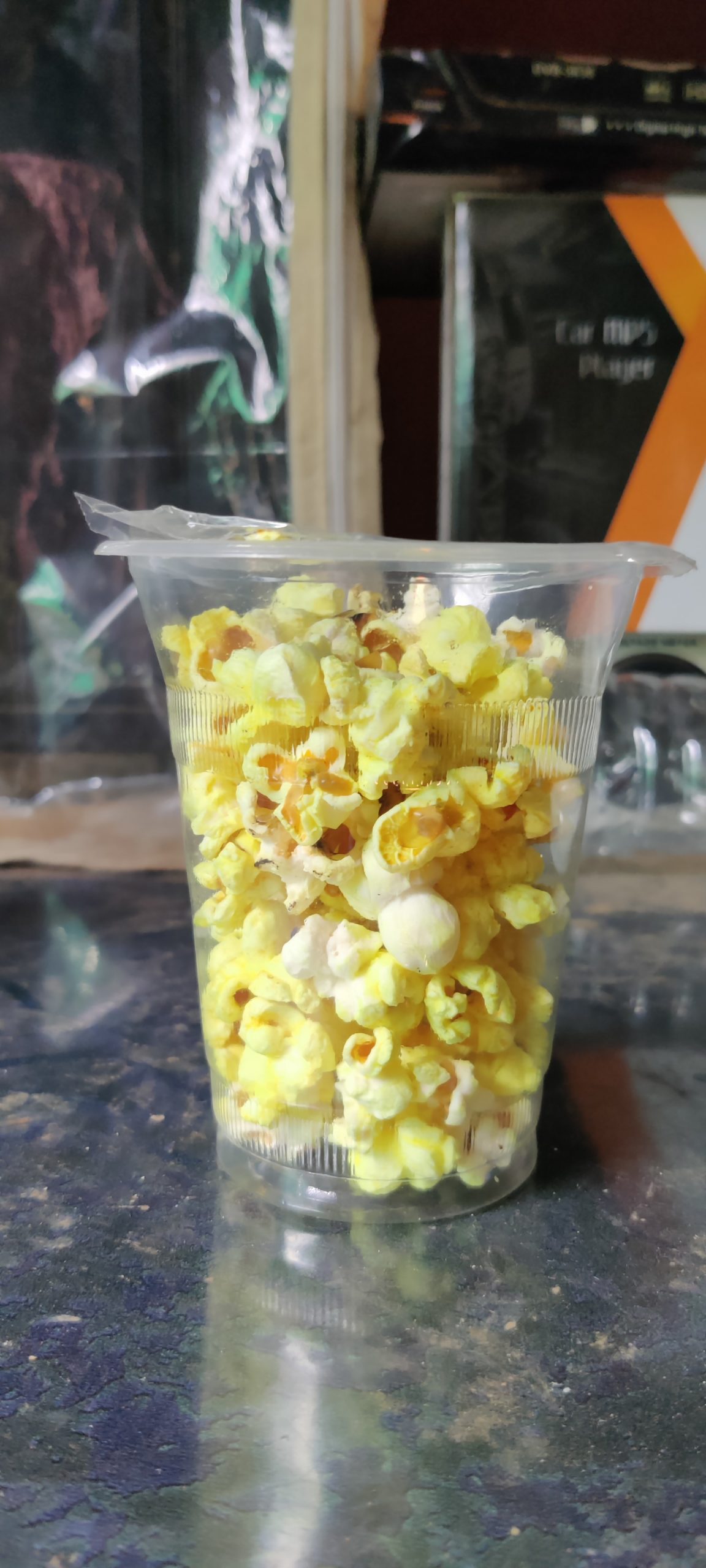 Popcorn in a plastic glass