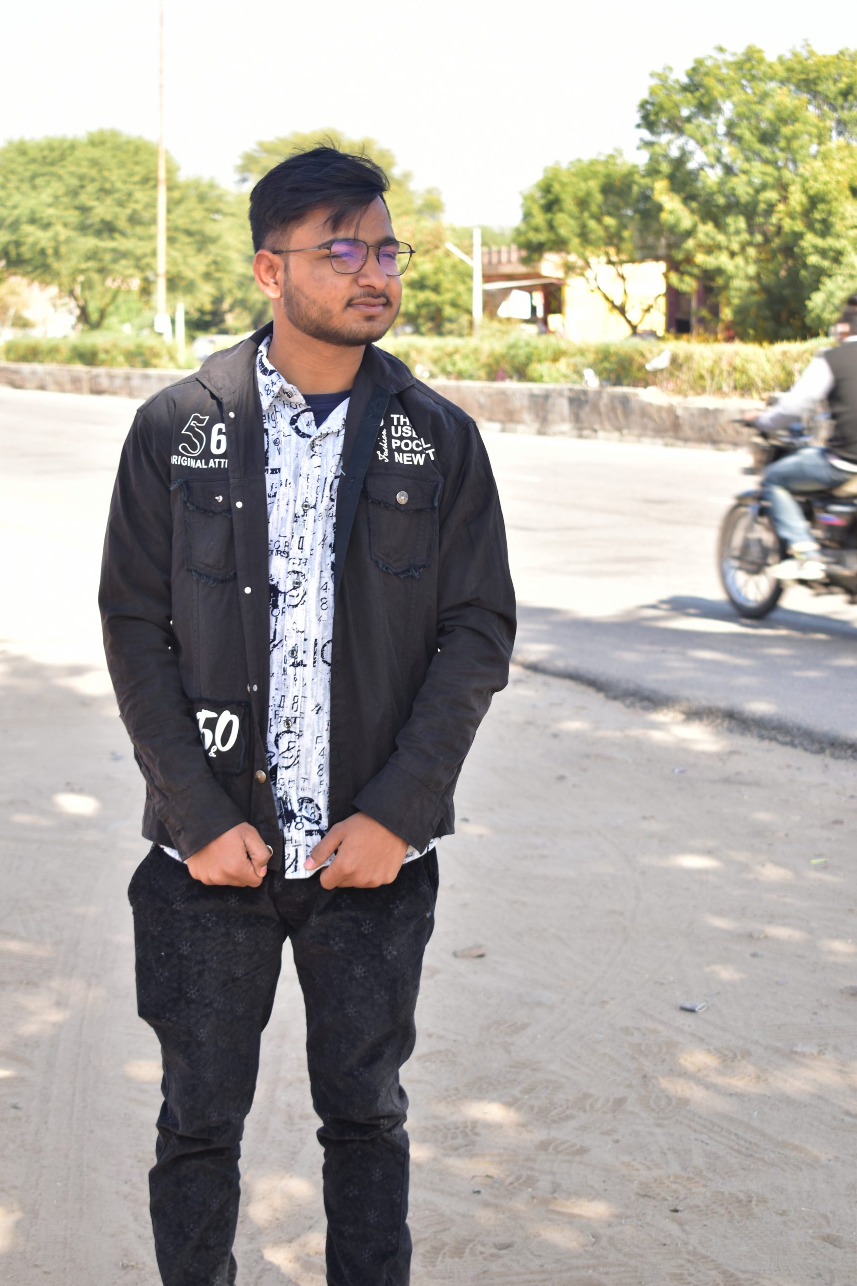 Boy posing on road