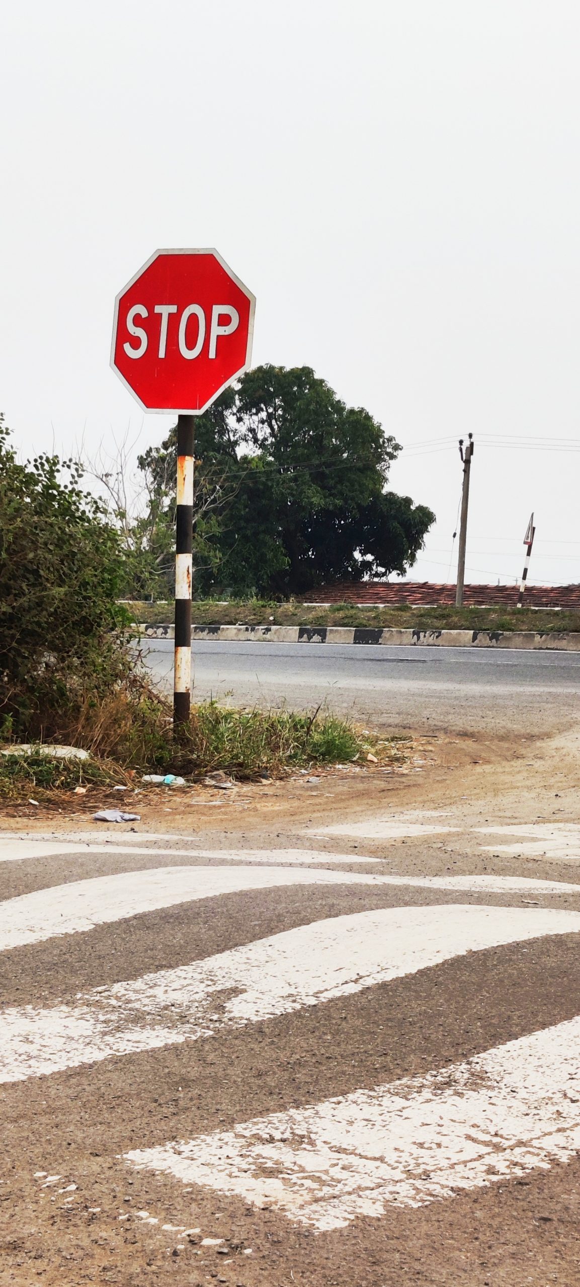 Stop sign board on a road
