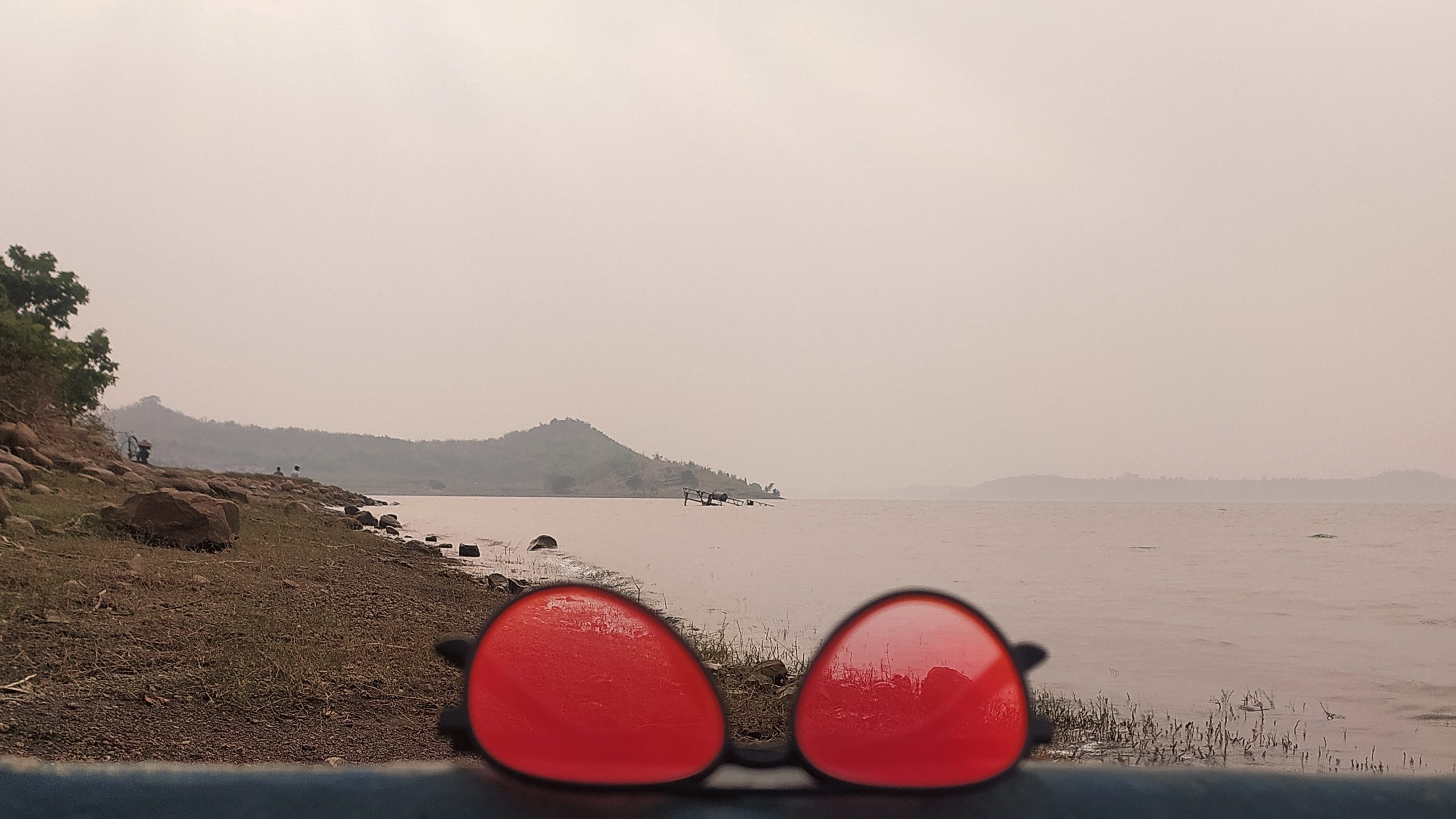 Sunglasses and a lake