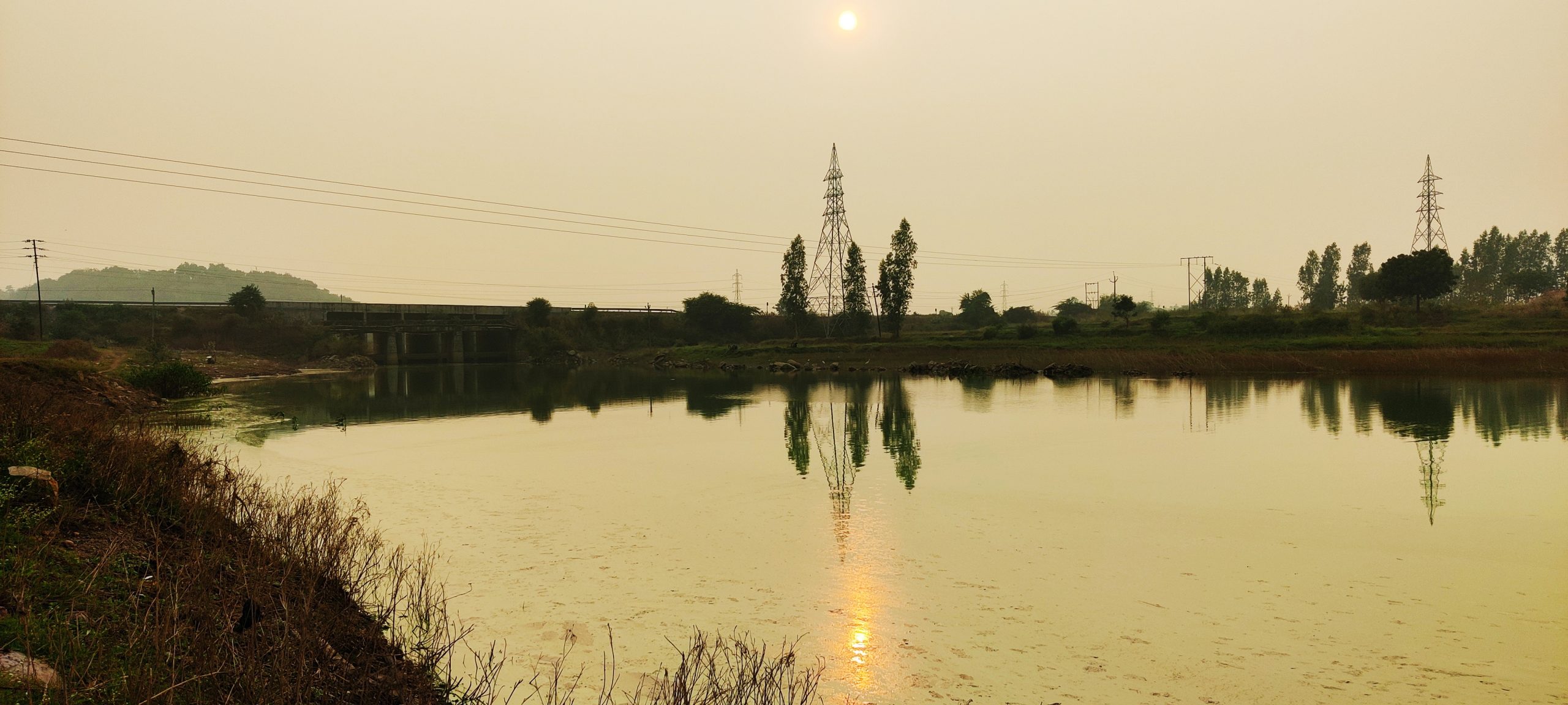 Sunset through a lake