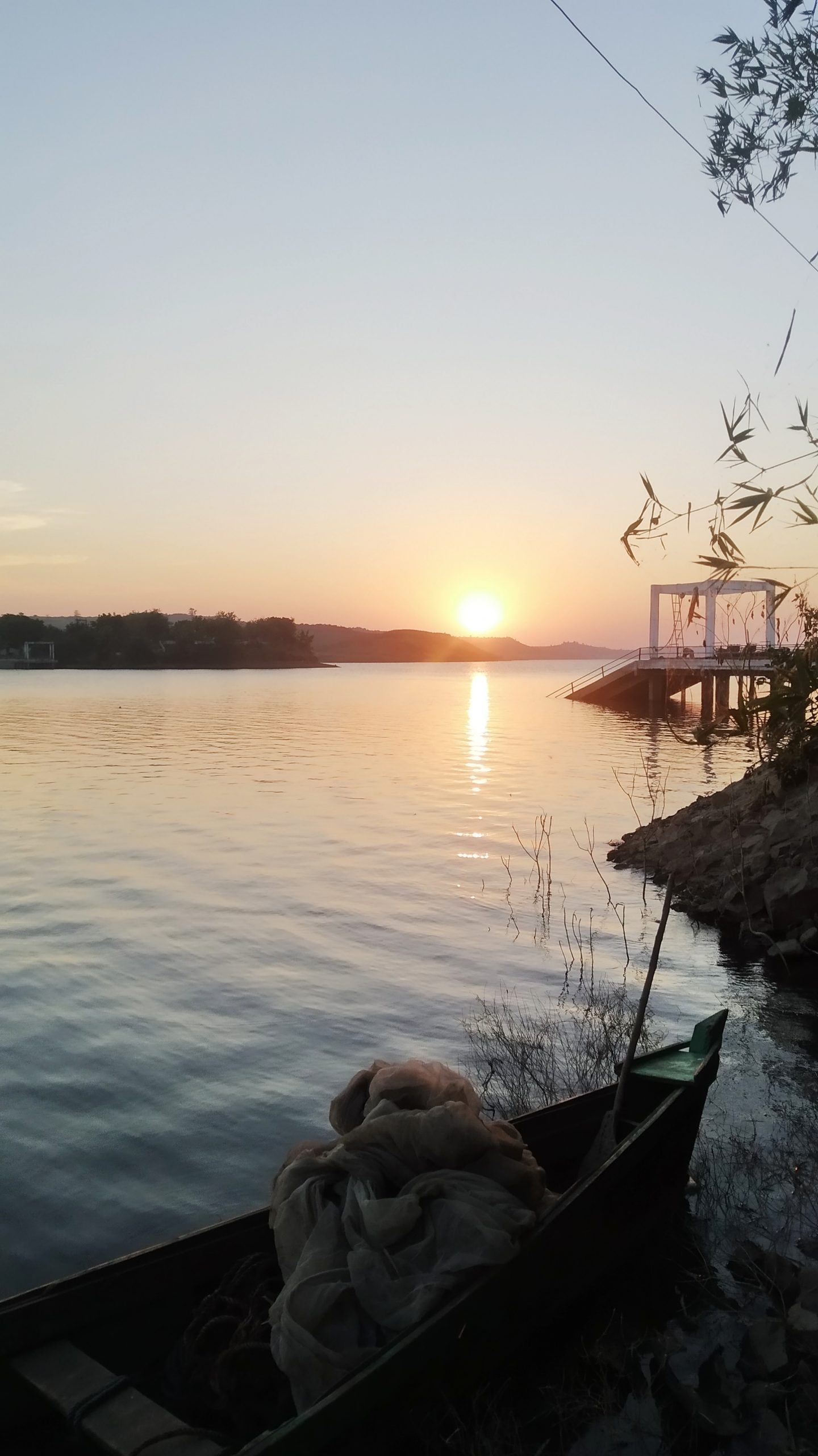 Sunset through a lake