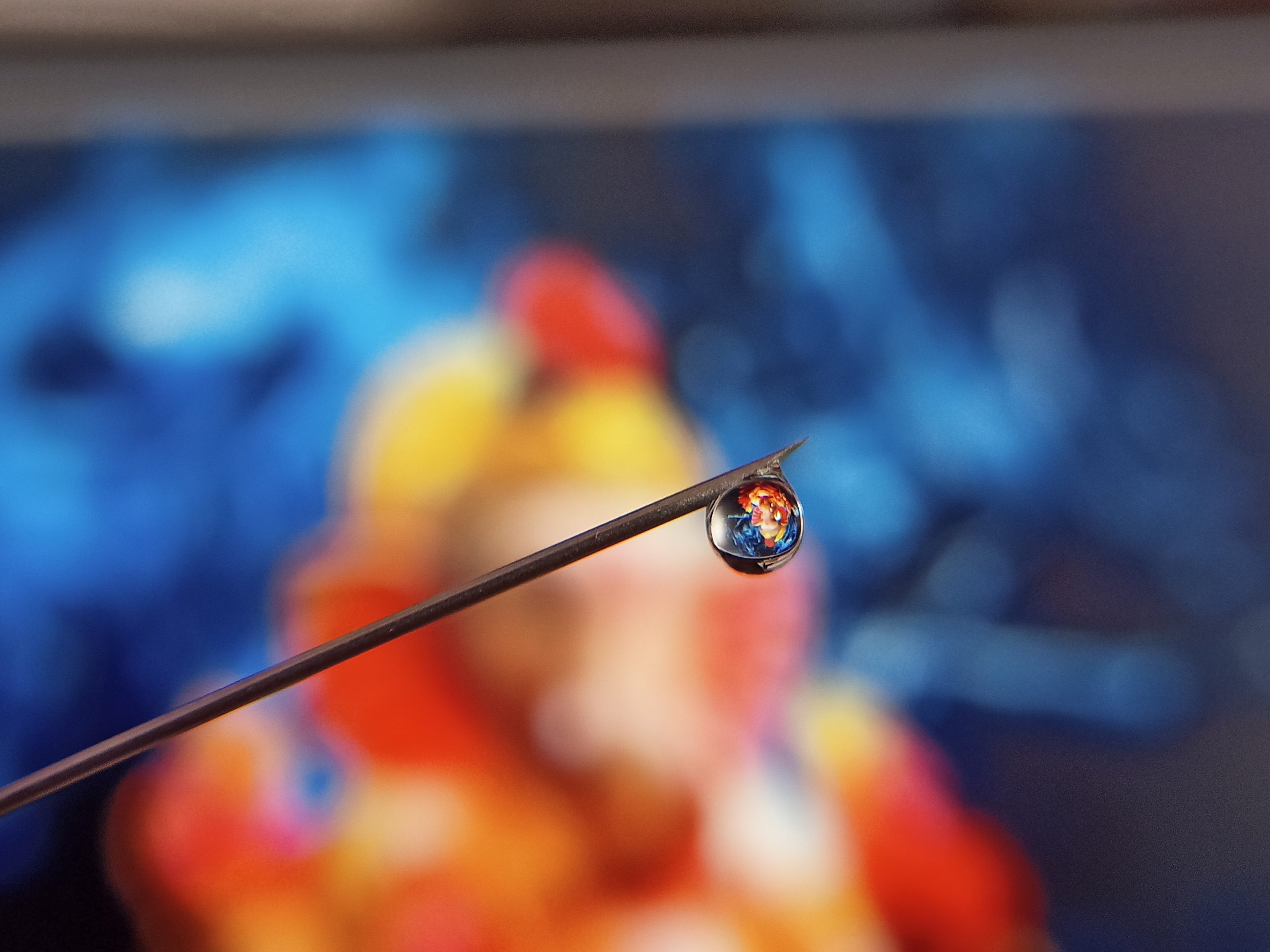 Water drop on a needle