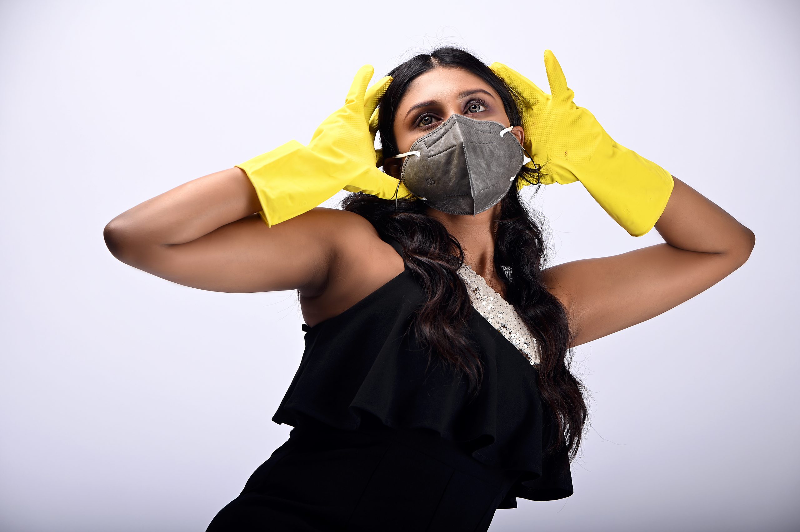 girl wearing mask and gloves