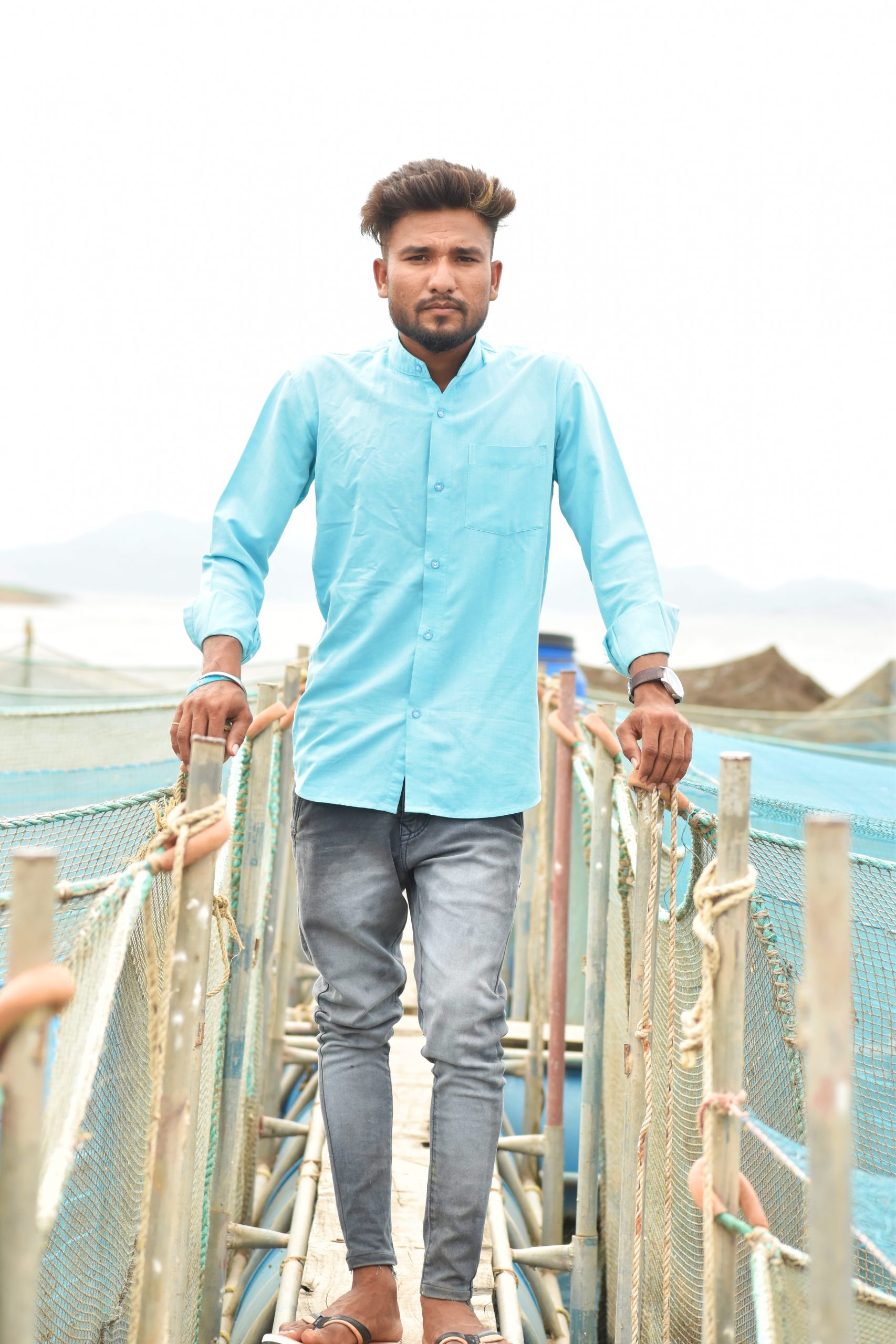 A boy on a footbridge