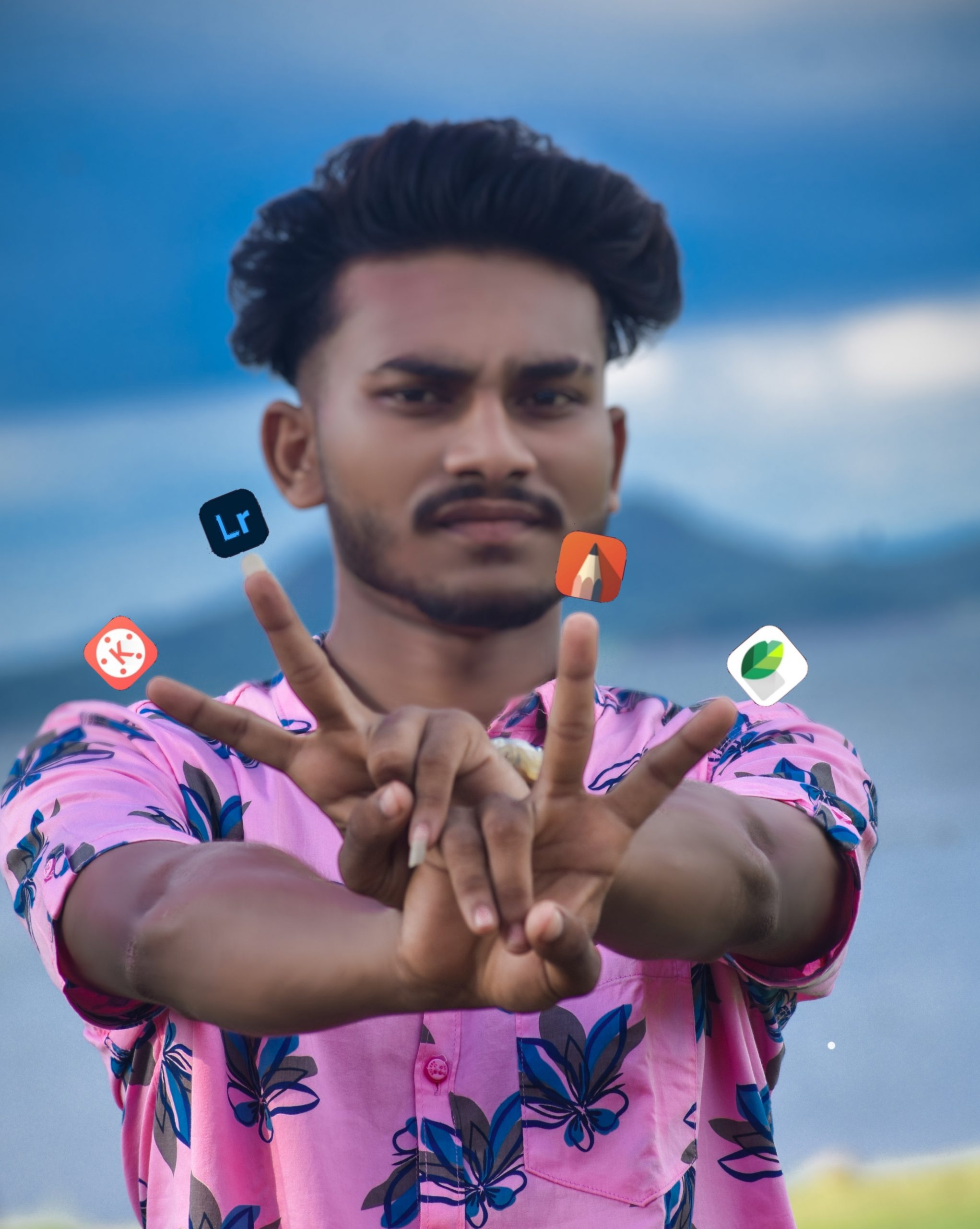 A boy showing icons on his fingers