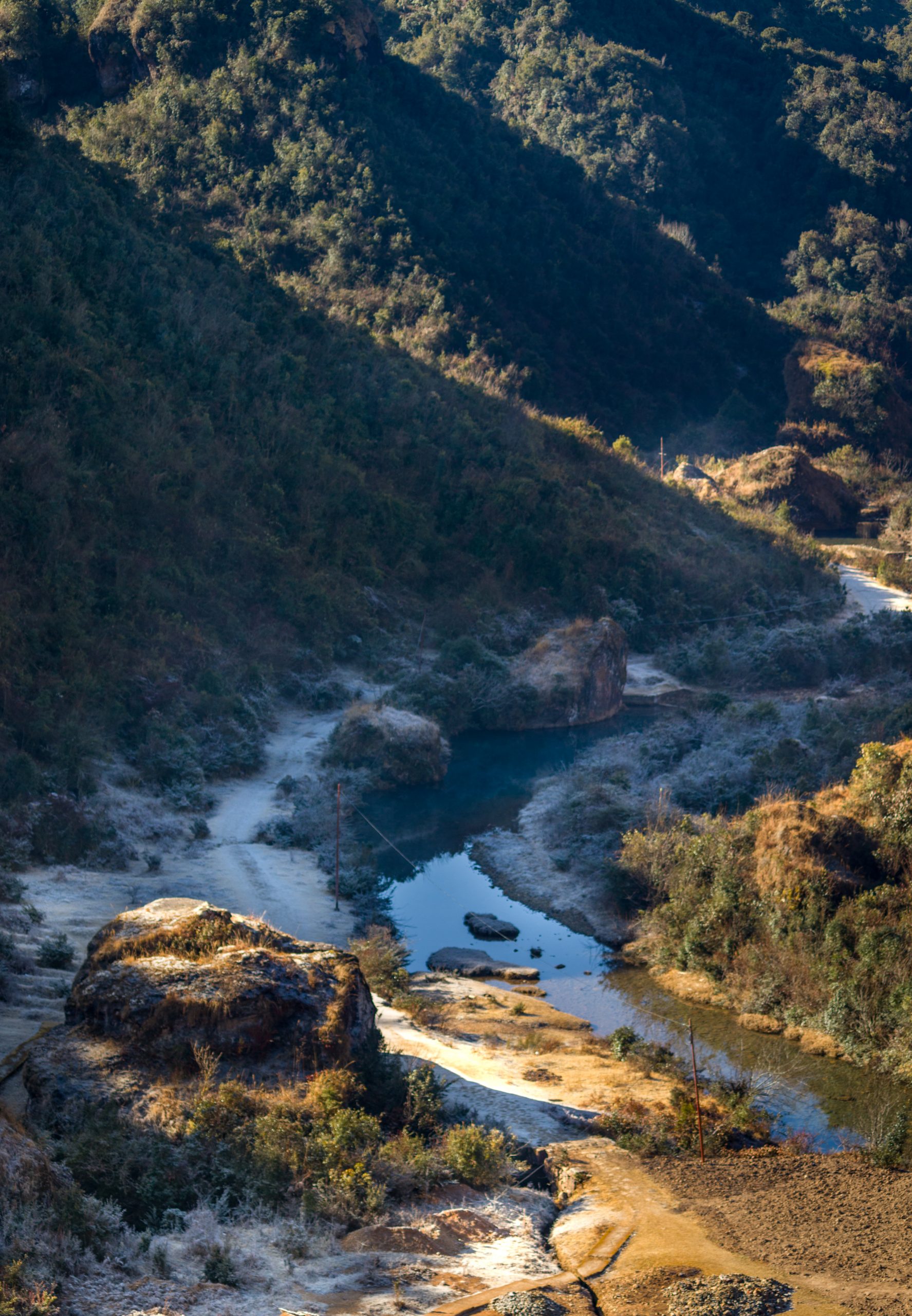 A river flowing under mountains