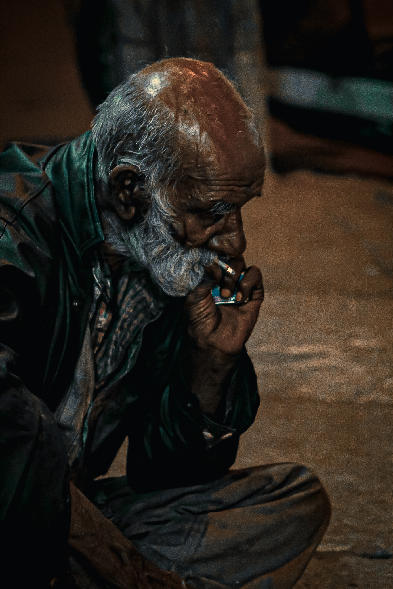 An old man smoking