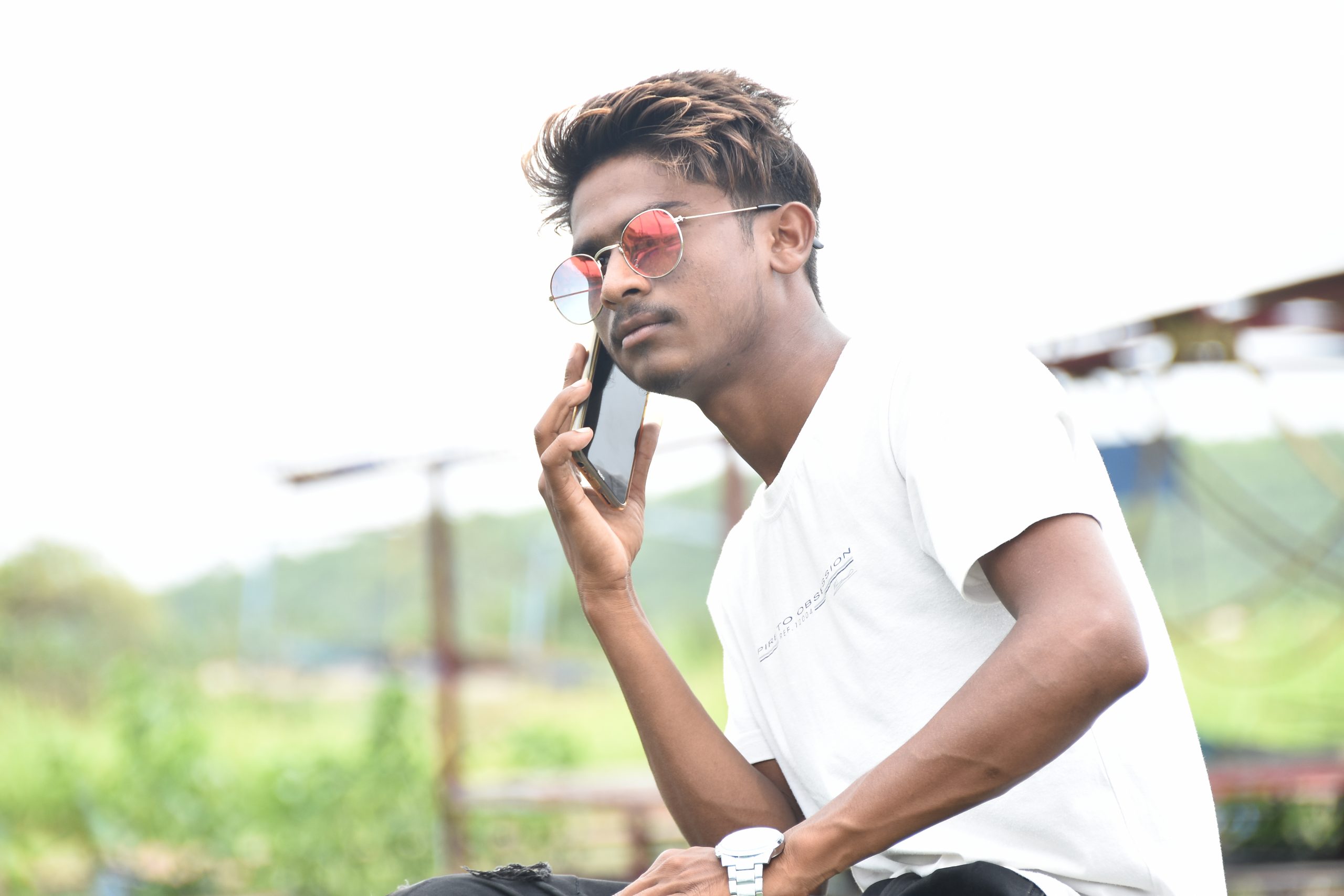 Boy posing with mobile