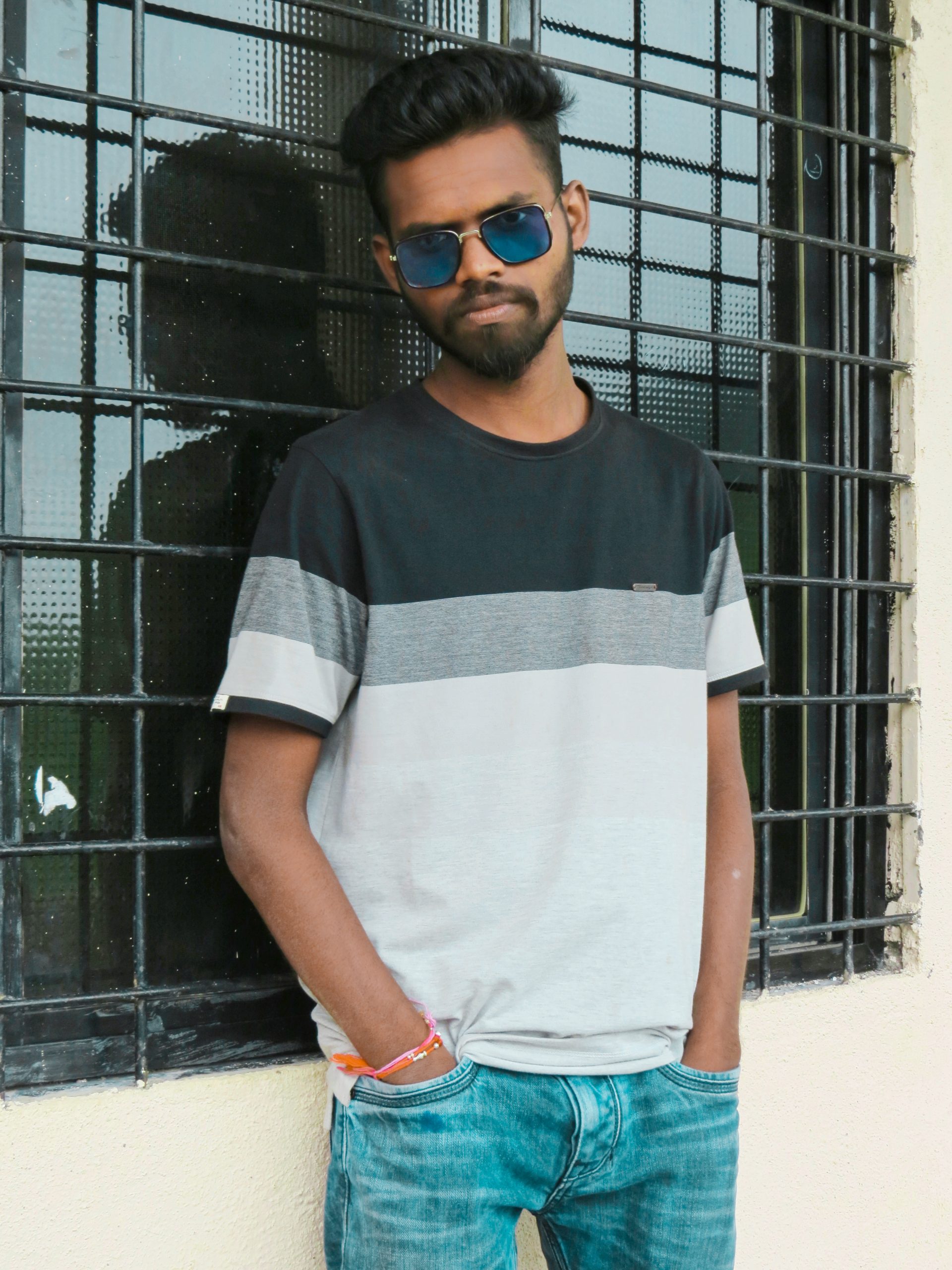 Boy posing near the window