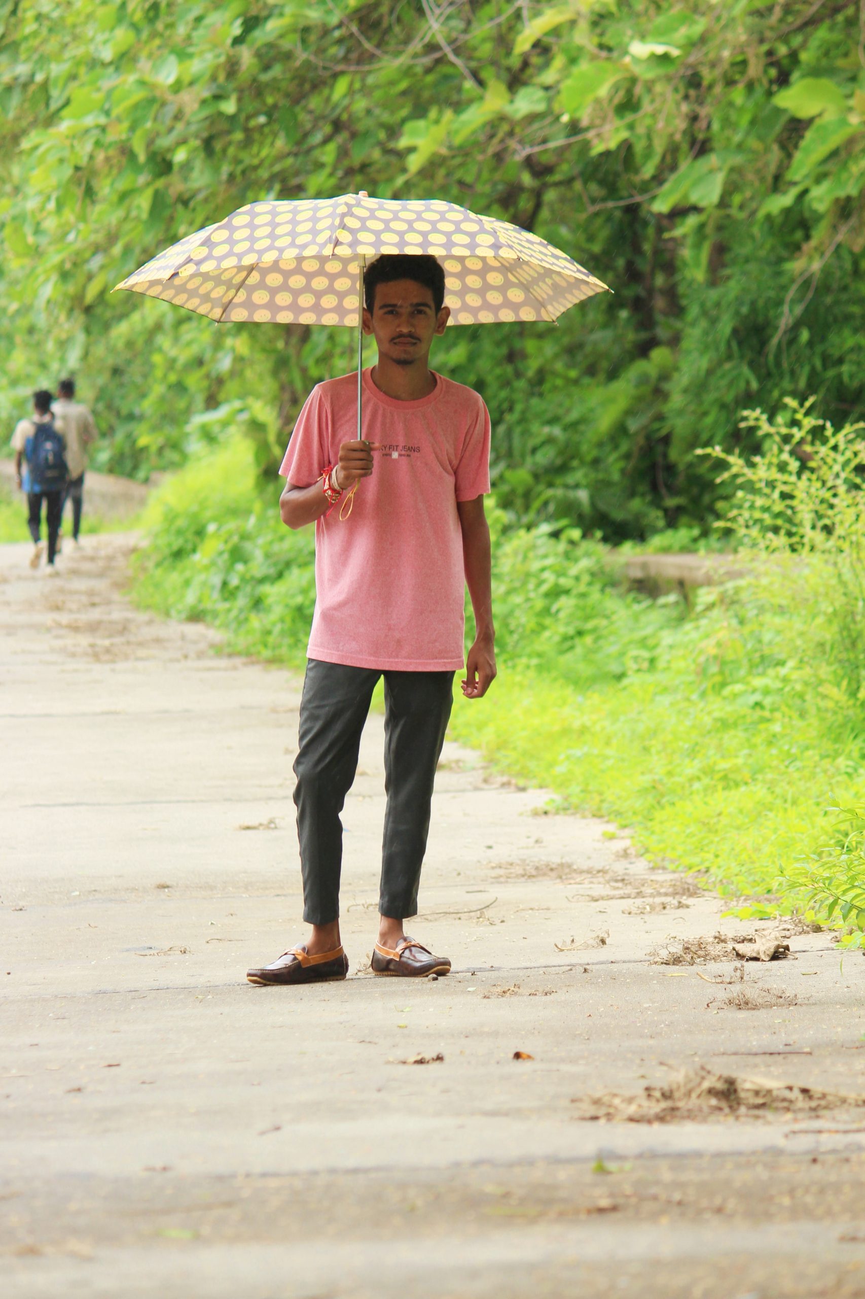 A boy with an umbrella