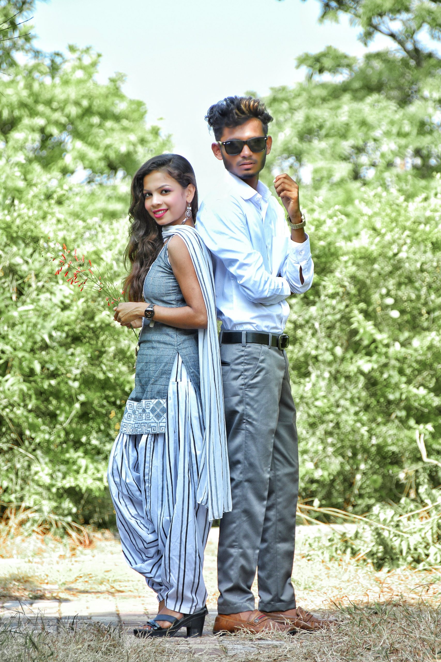 Couple posing in the forest