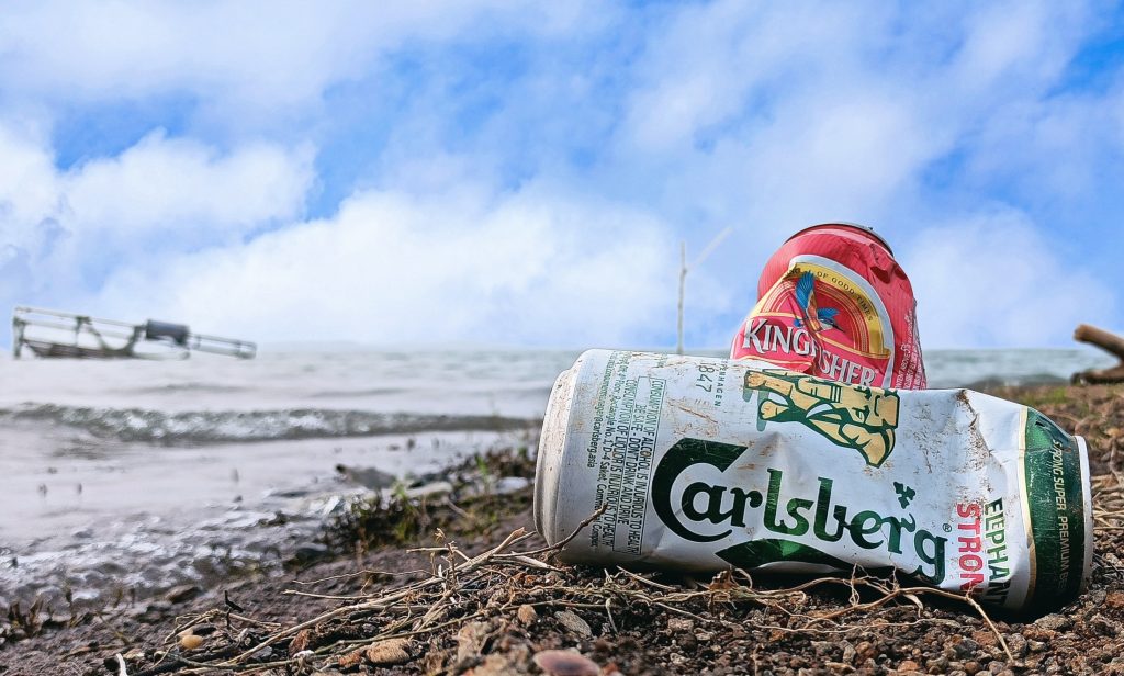 Empty beer can on a beach PixaHive