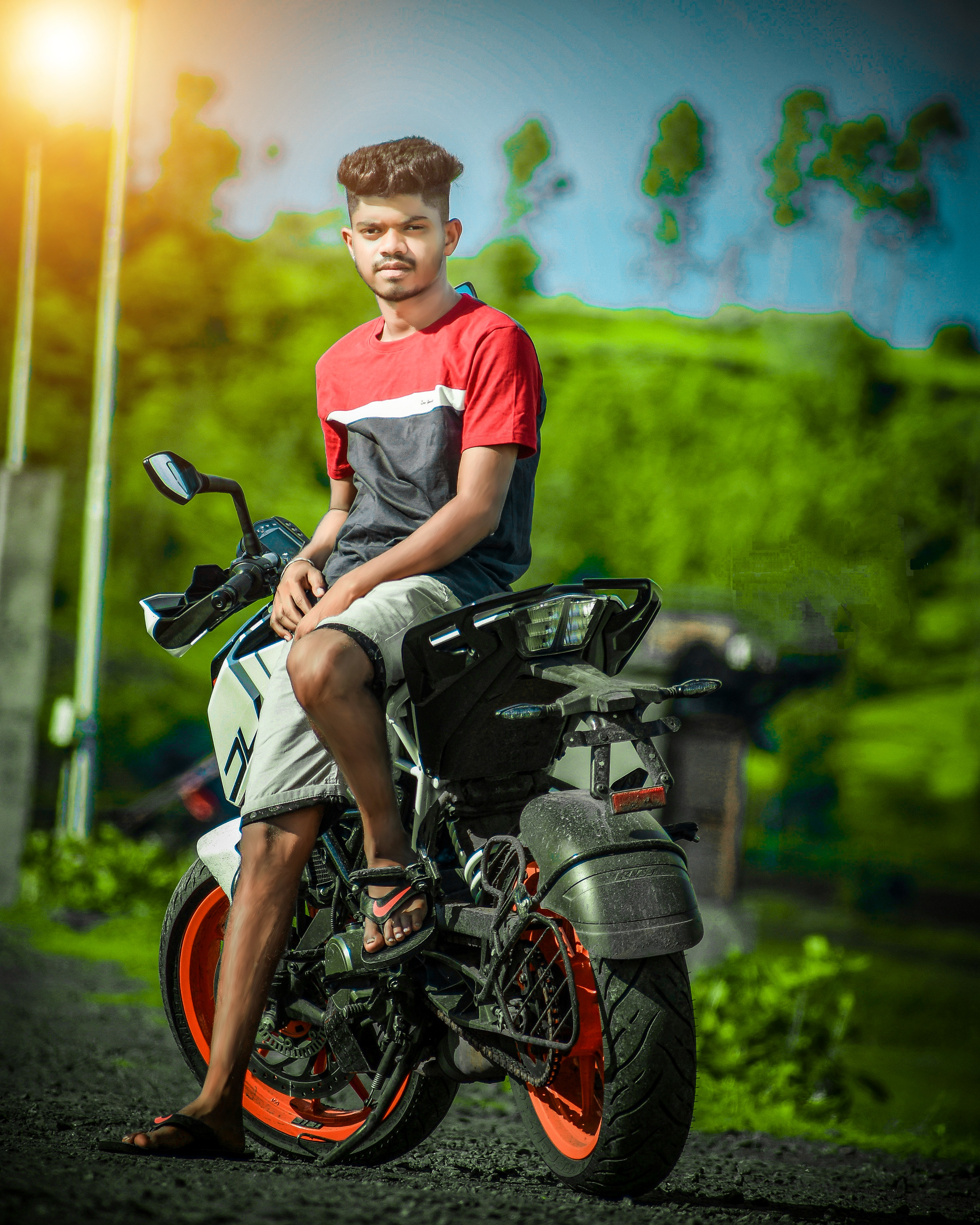 A boy on a motorcycle