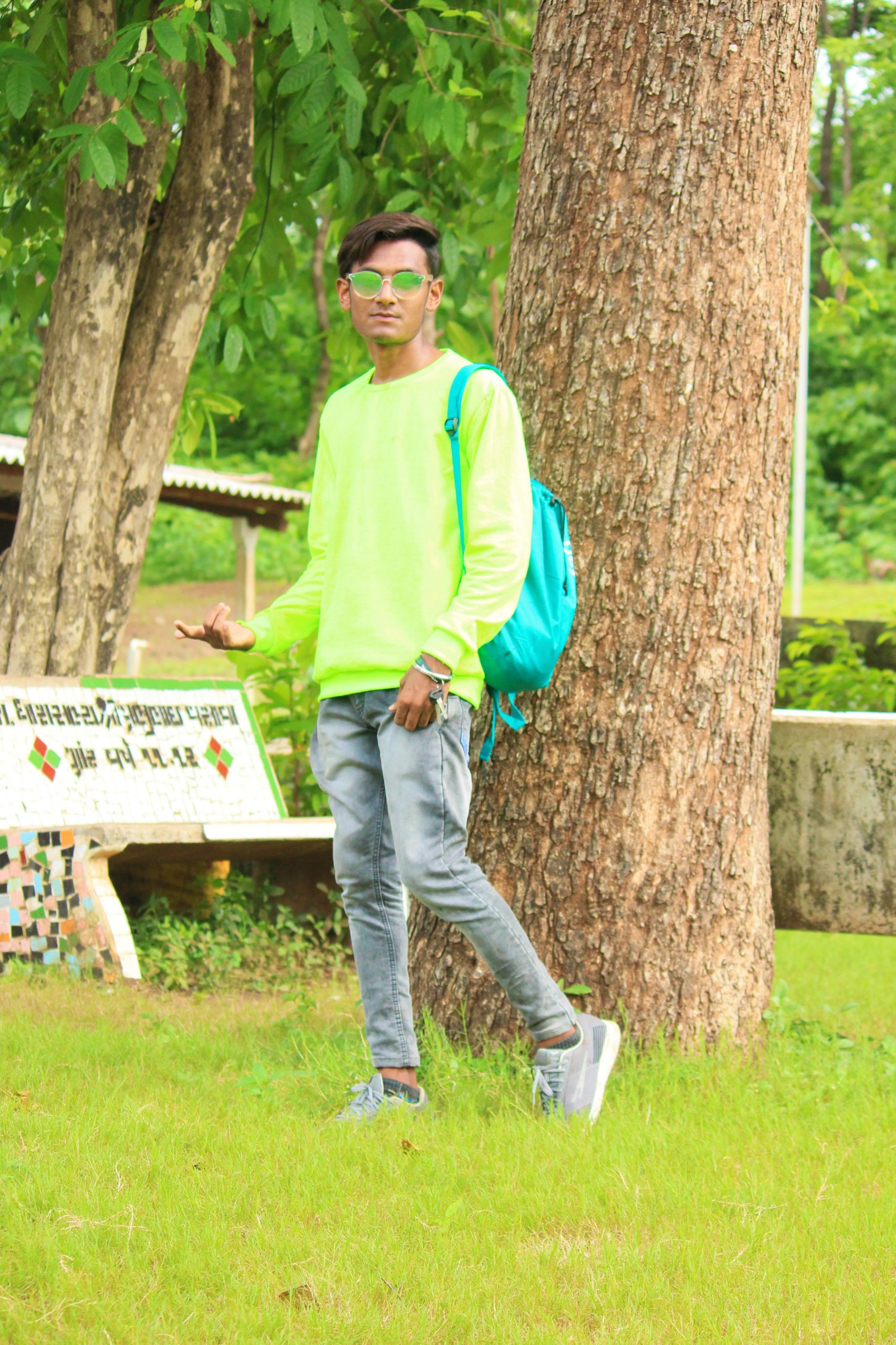 A boy along a tree