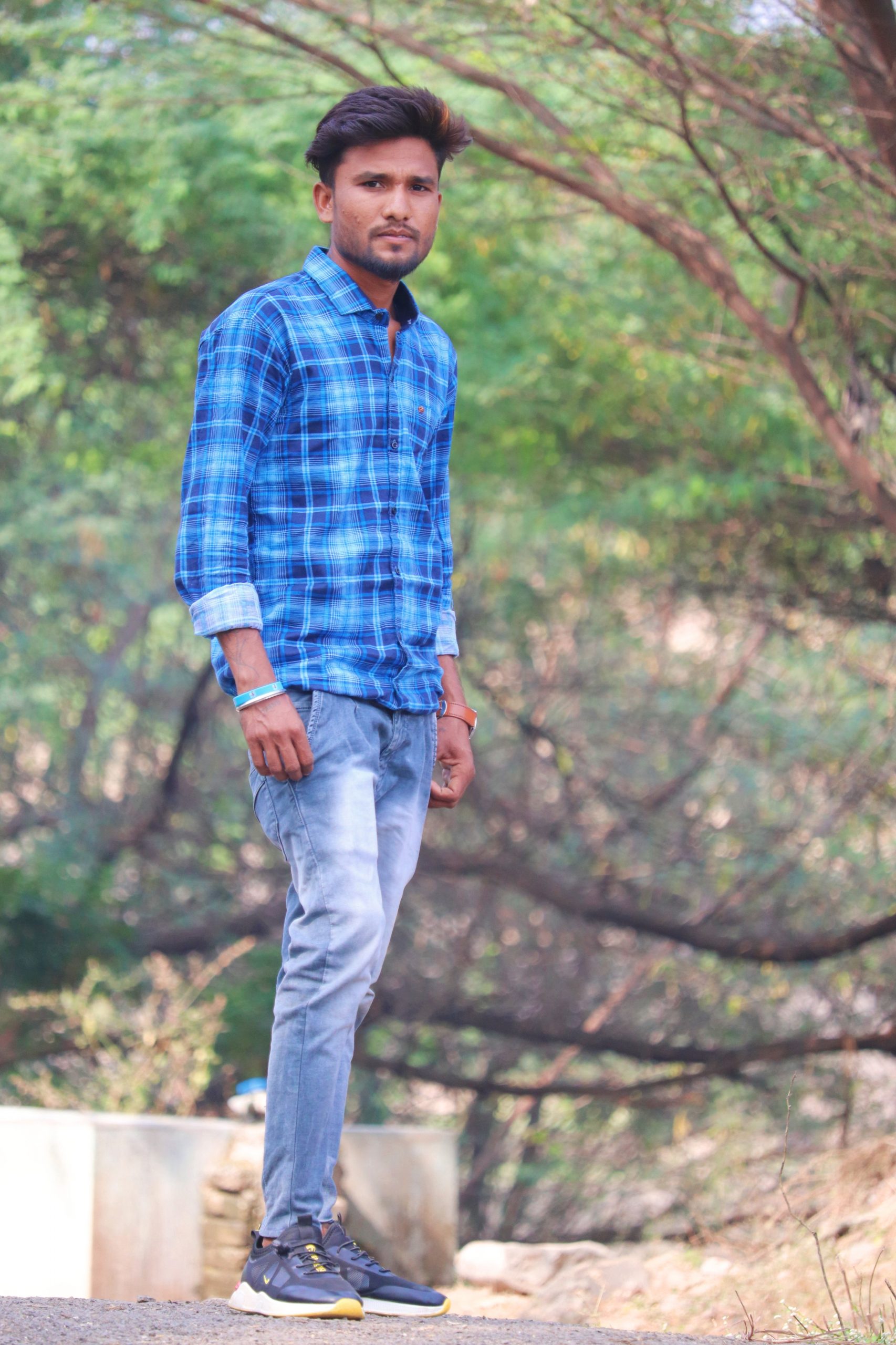 Model posing in the forest