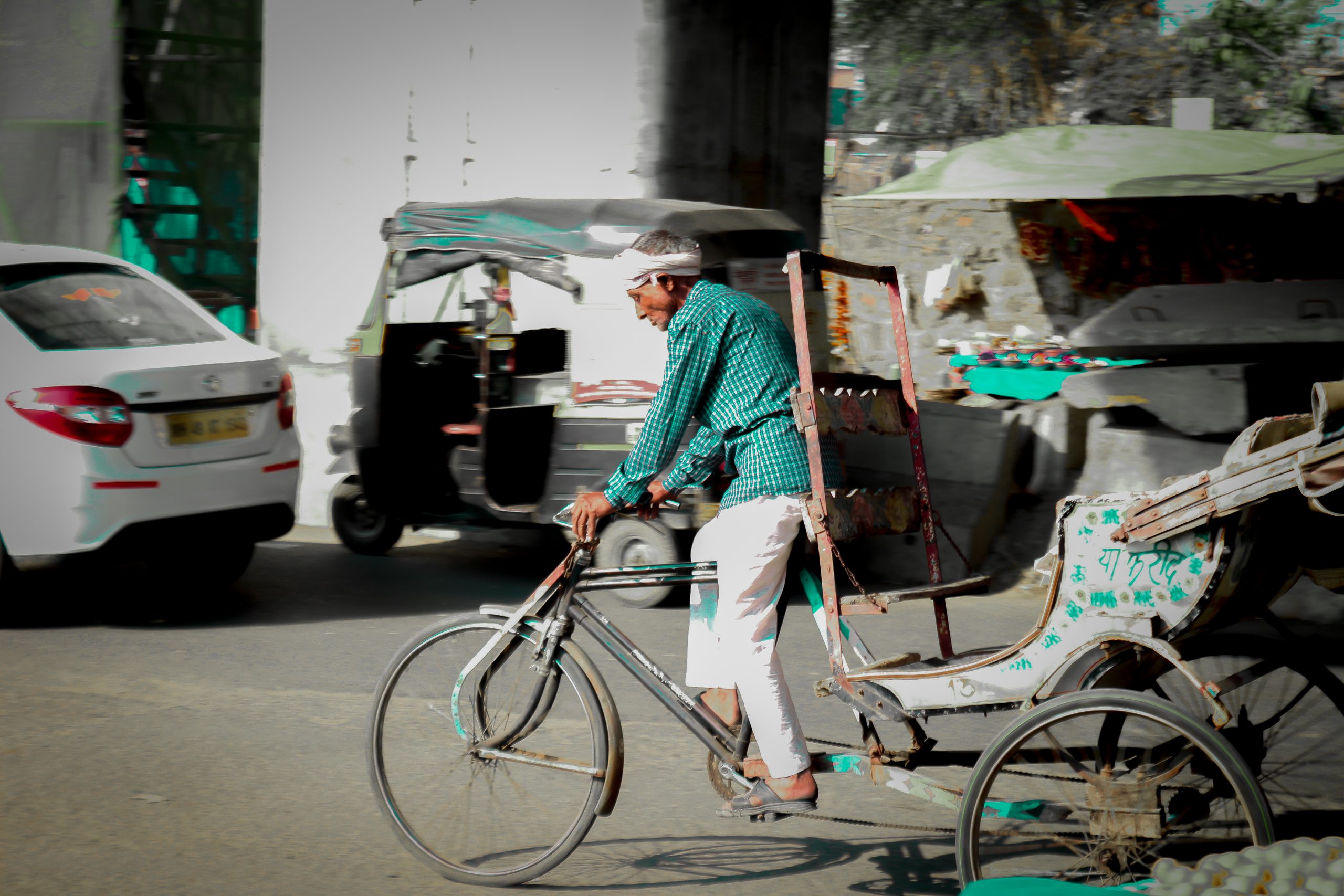 Old Man riding rickshaw