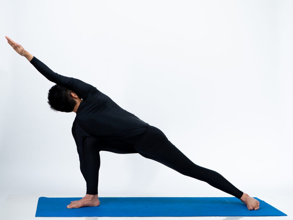 Parivrtta parsvakonasana (Revolved side angle Pose) - PixaHive