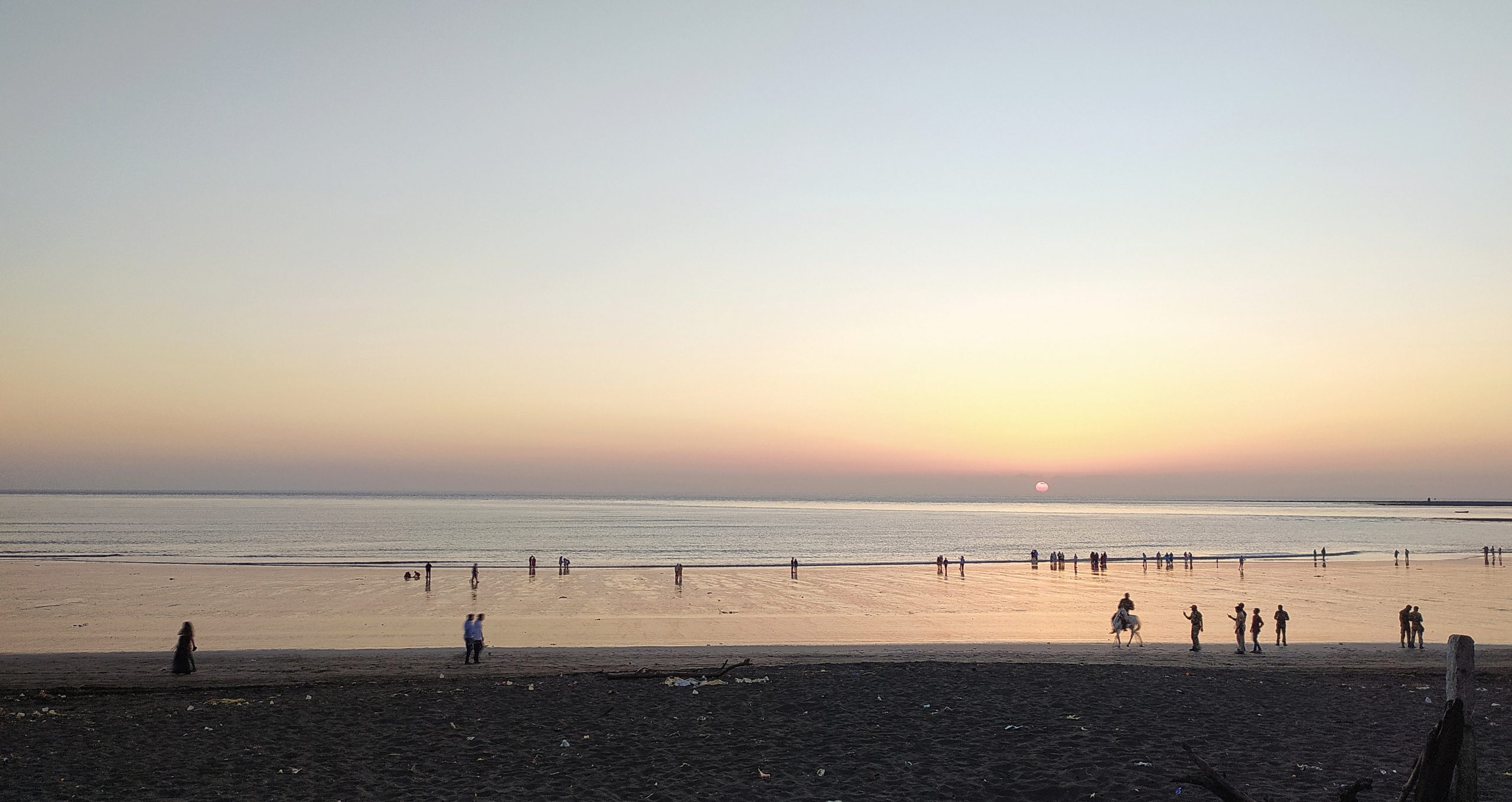 People at a beach during evening