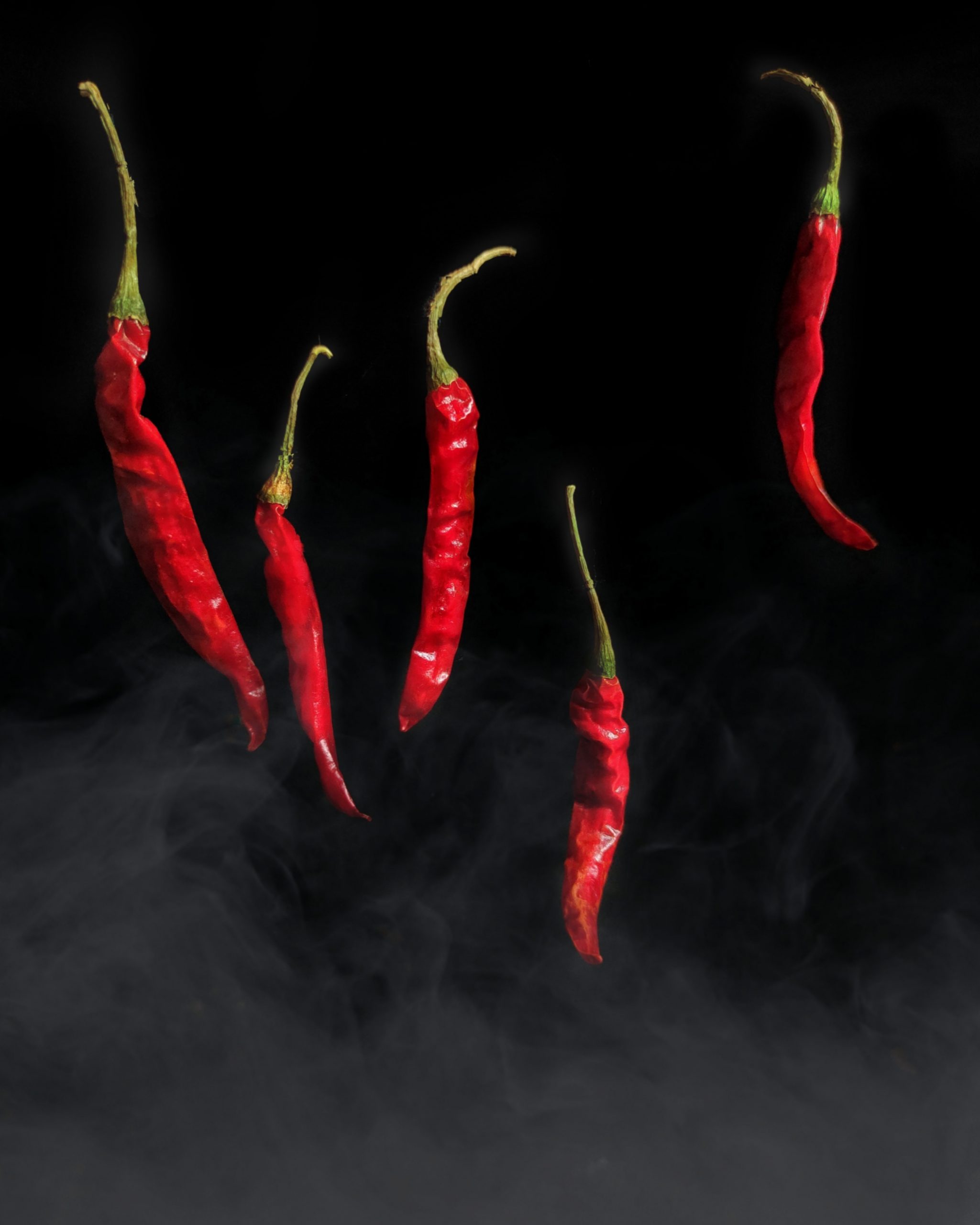 Red chilies with smoke