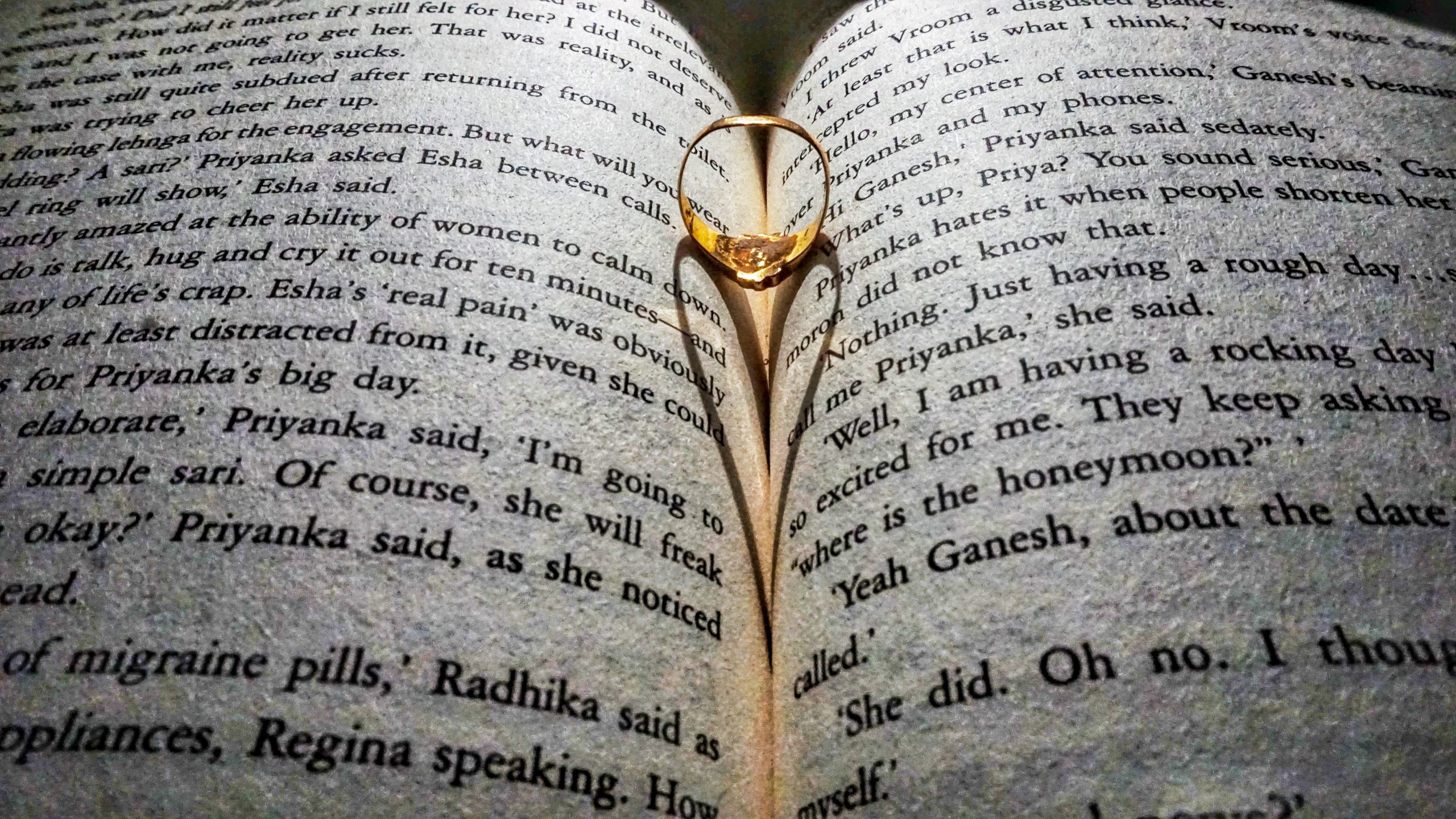Shadow of a ring on book
