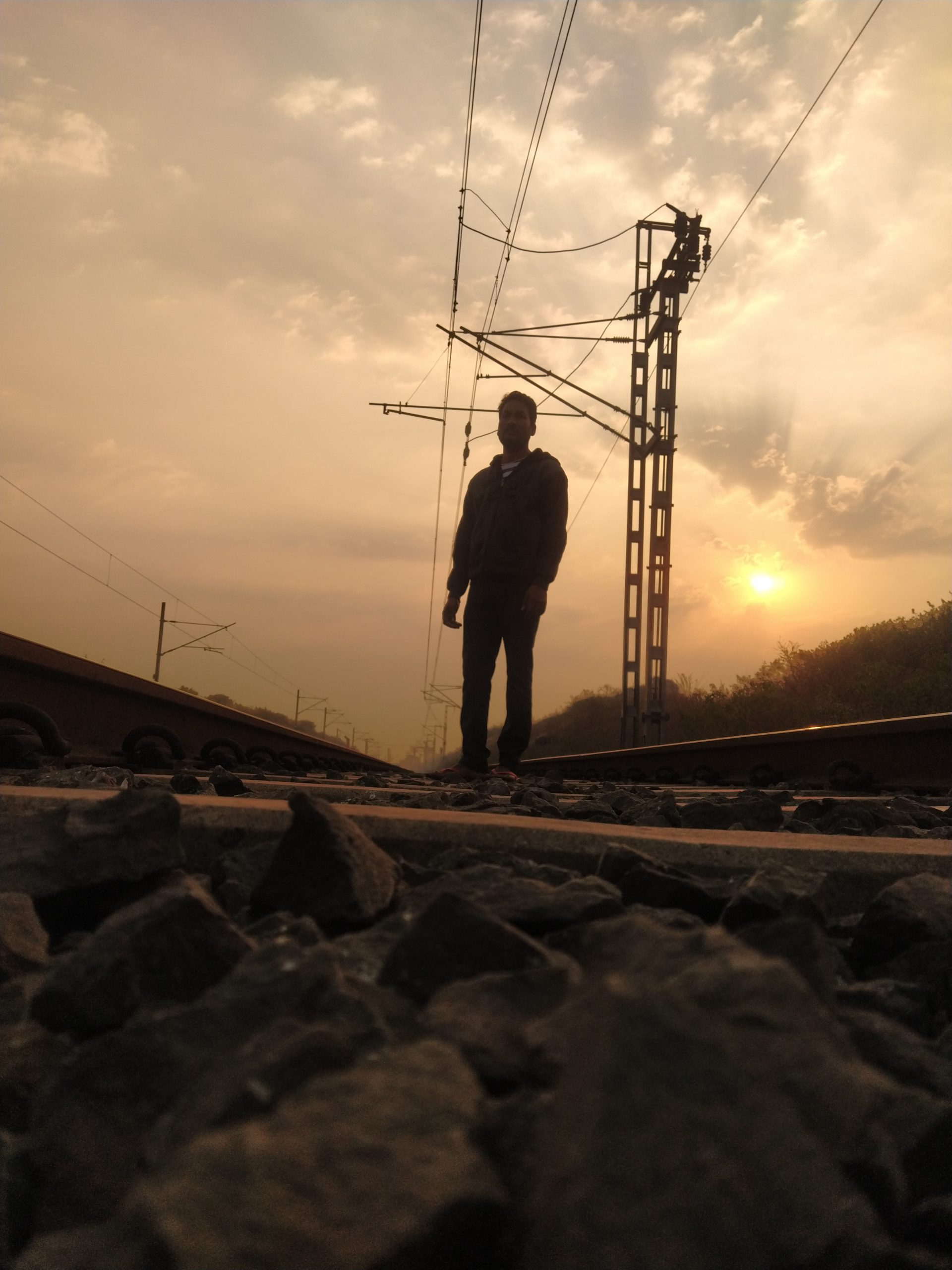 A boy on a railway track