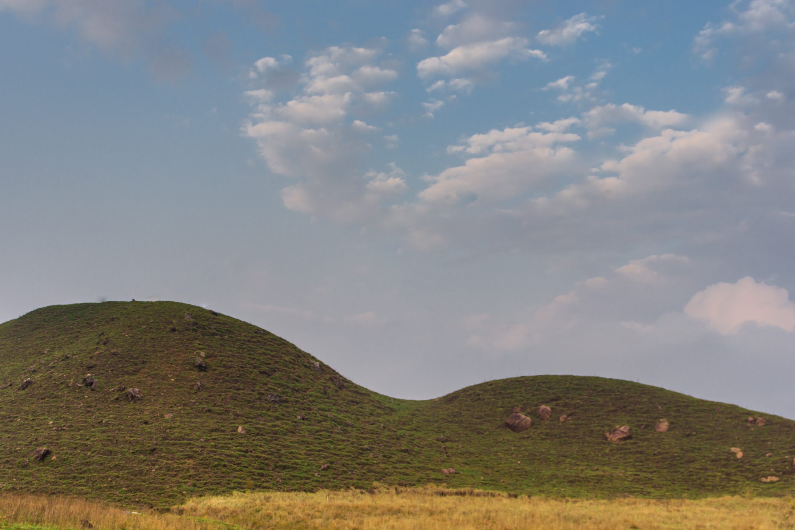 A hill and sky