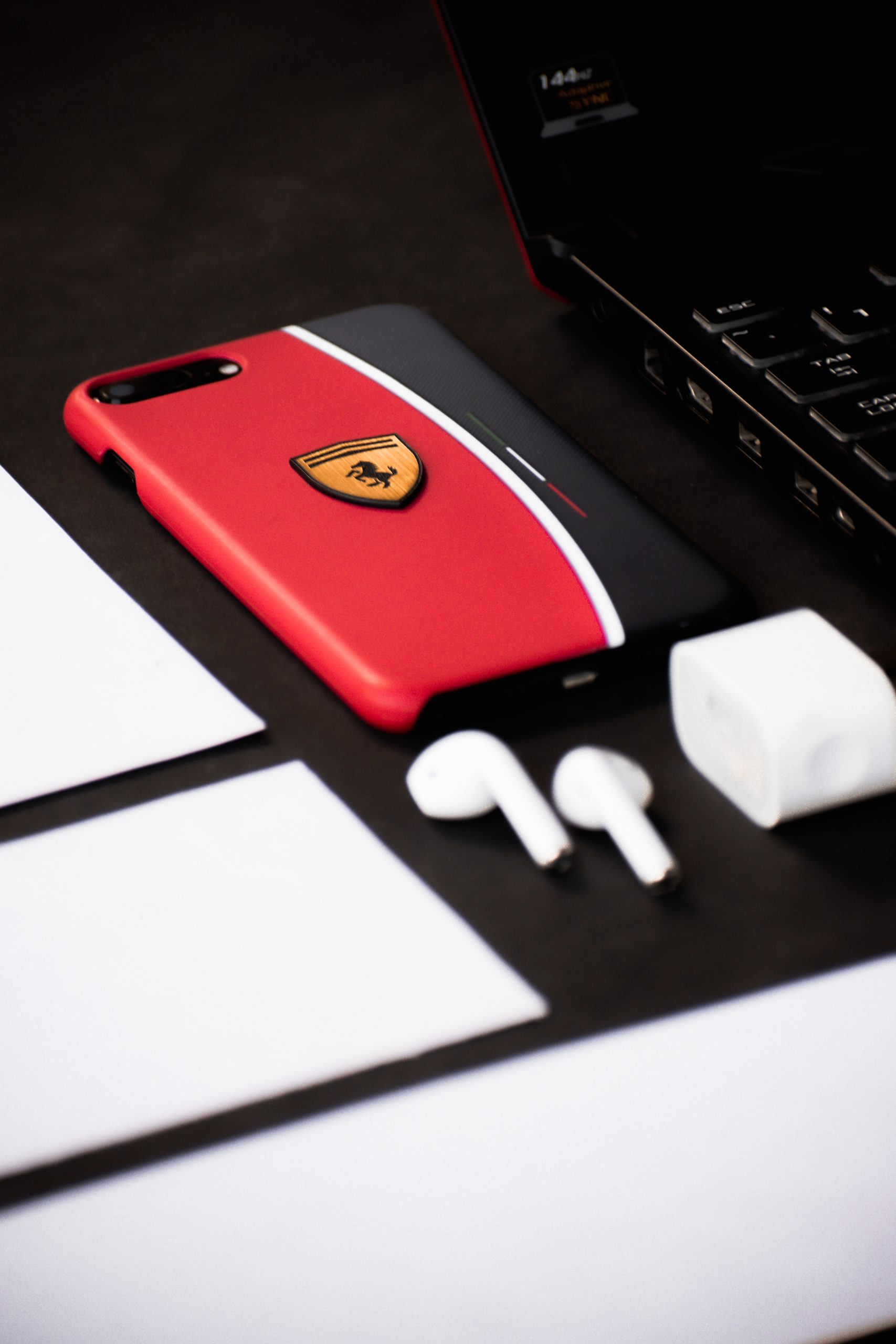 A phone cover and bluetooth earphones